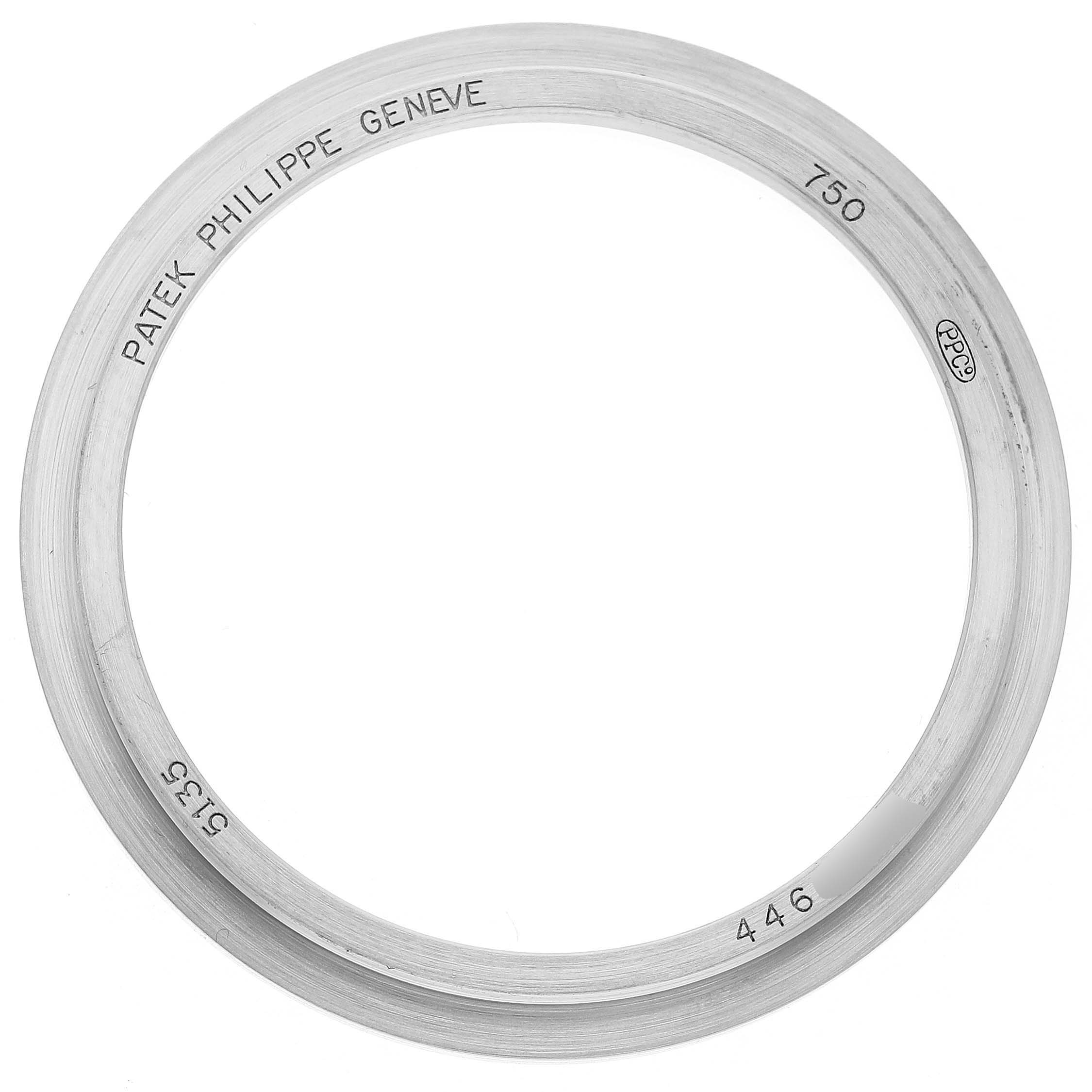 This image shows the bezel of a Patek Philippe Gondolo Men's White Gold Silver Dial watch viewed from above.