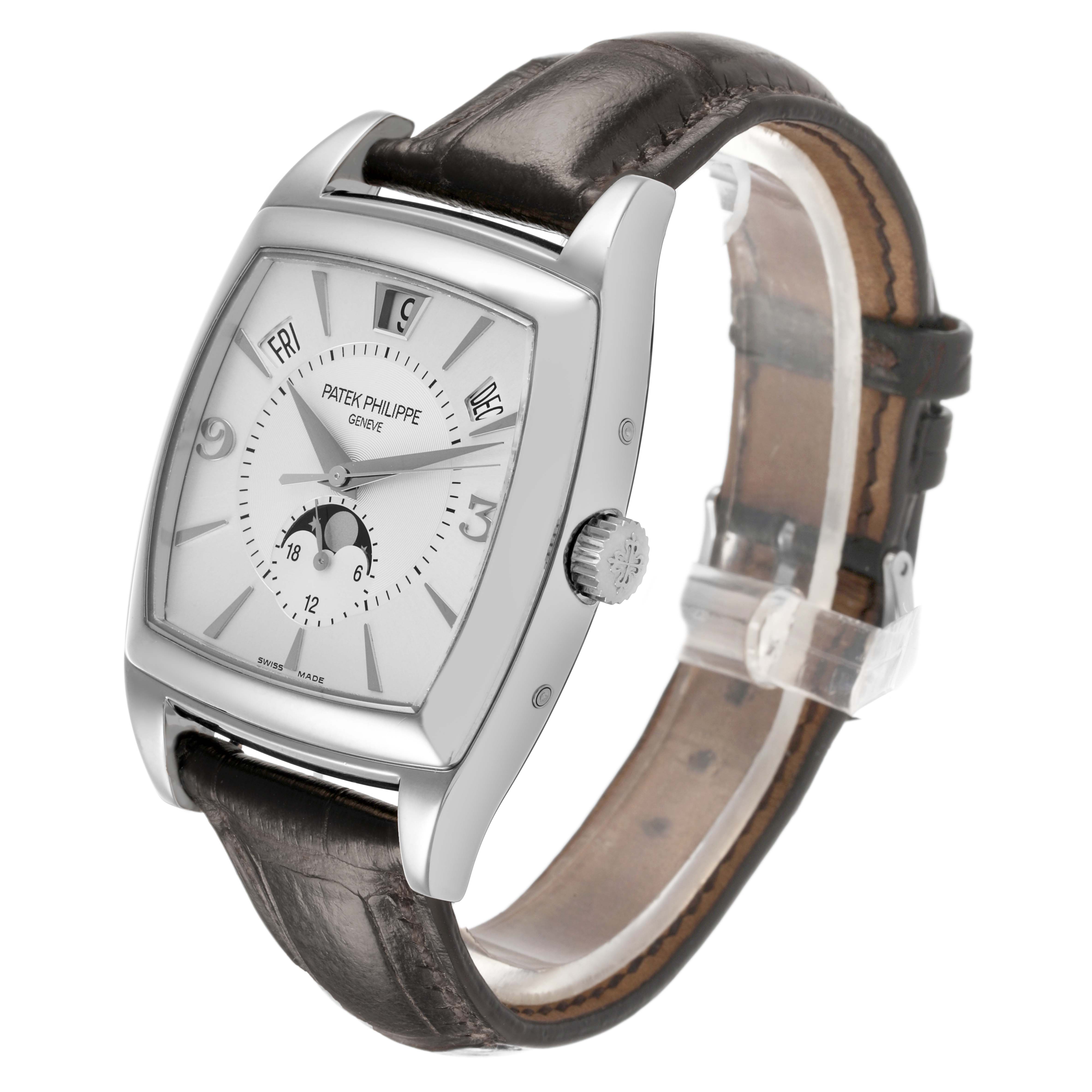 The Patek Philippe Gondolo Men's White Gold Silver Dial watch is shown at an oblique angle, highlighting the dial, case, crown, and leather strap.