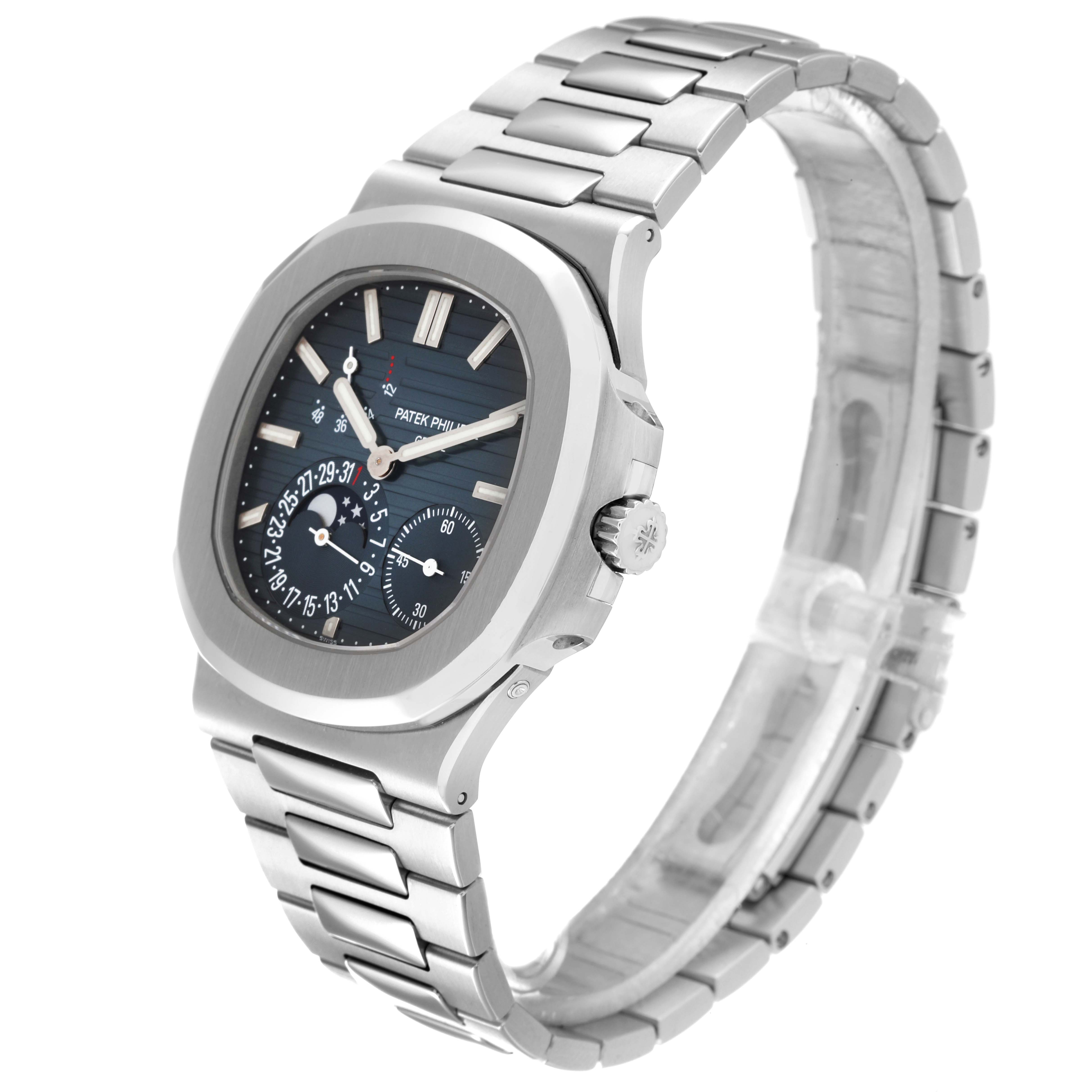 This image shows a Patek Philippe Nautilus 5712/1A-001 Men
s Stainless Steel Blue Dial 5712/1A-001 Men
s Stainless Steel Blue Dial watch from an angled side view, highlighting its face and bracelet.