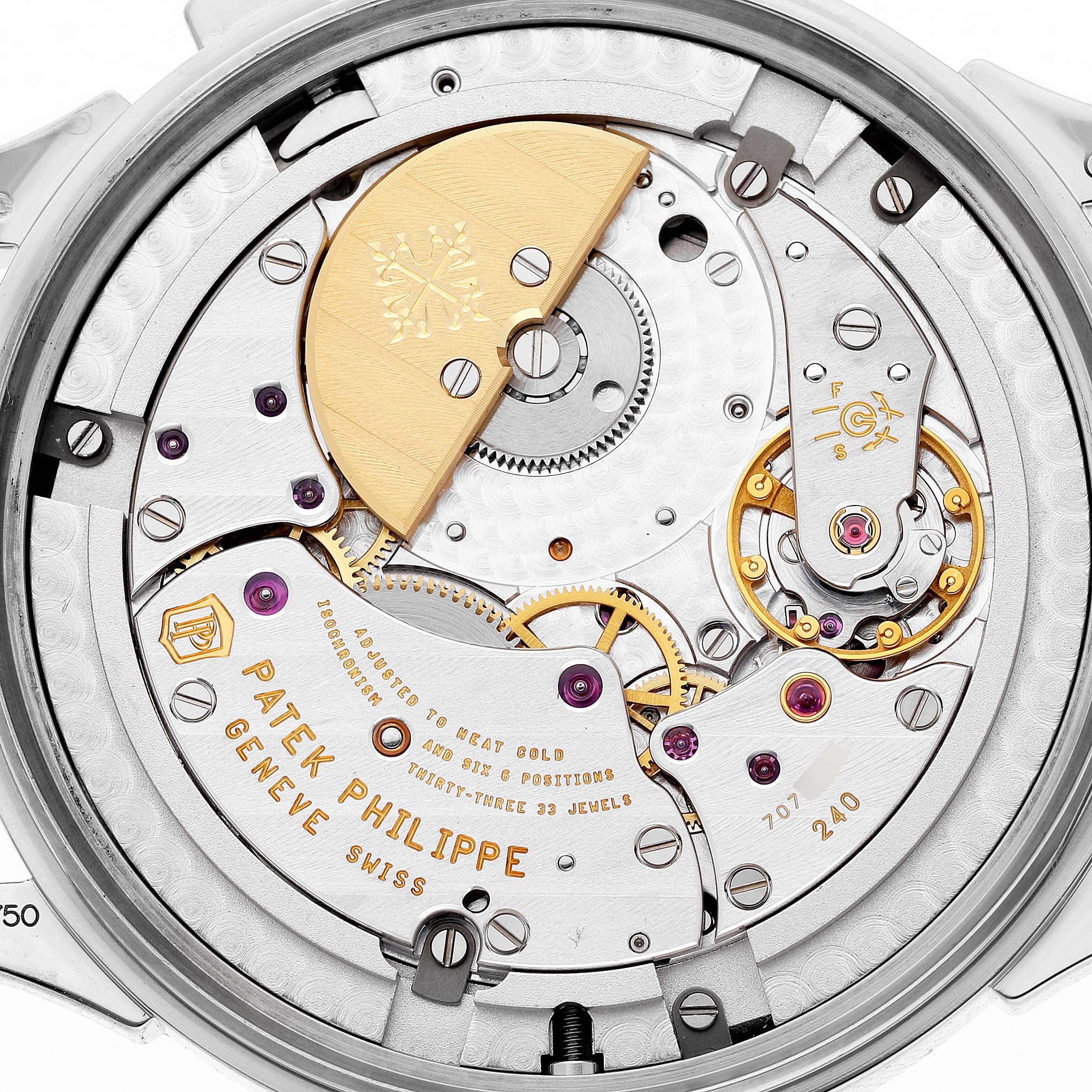The image shows the intricate movement and rotor of a Patek Philippe Complications 5230G-001 Men's White Gold Grey Dial model from a back angle.