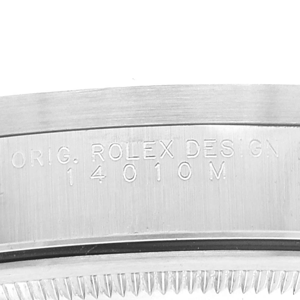 A close-up angle showing the engraved text and serial number on the bezel of a Rolex Air-King 14010 Men's Stainless Steel Black Dial 14010 Men's Stainless Steel Black Dial watch.