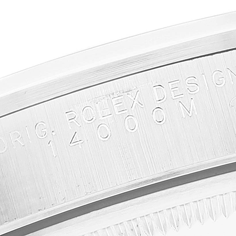 This image shows a close-up of the engraved bezel of a Rolex Air-King 14000M Men's Stainless Steel Black Dial 14000M Men's Stainless Steel Black Dial model watch.