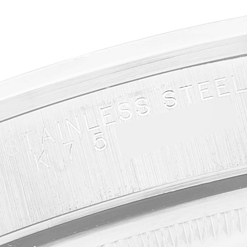 This close-up image shows the side engraving on the stainless steel casing of a Rolex Air-King 14000M Men's Stainless Steel Black Dial 14000M Men's Stainless Steel Black Dial watch.