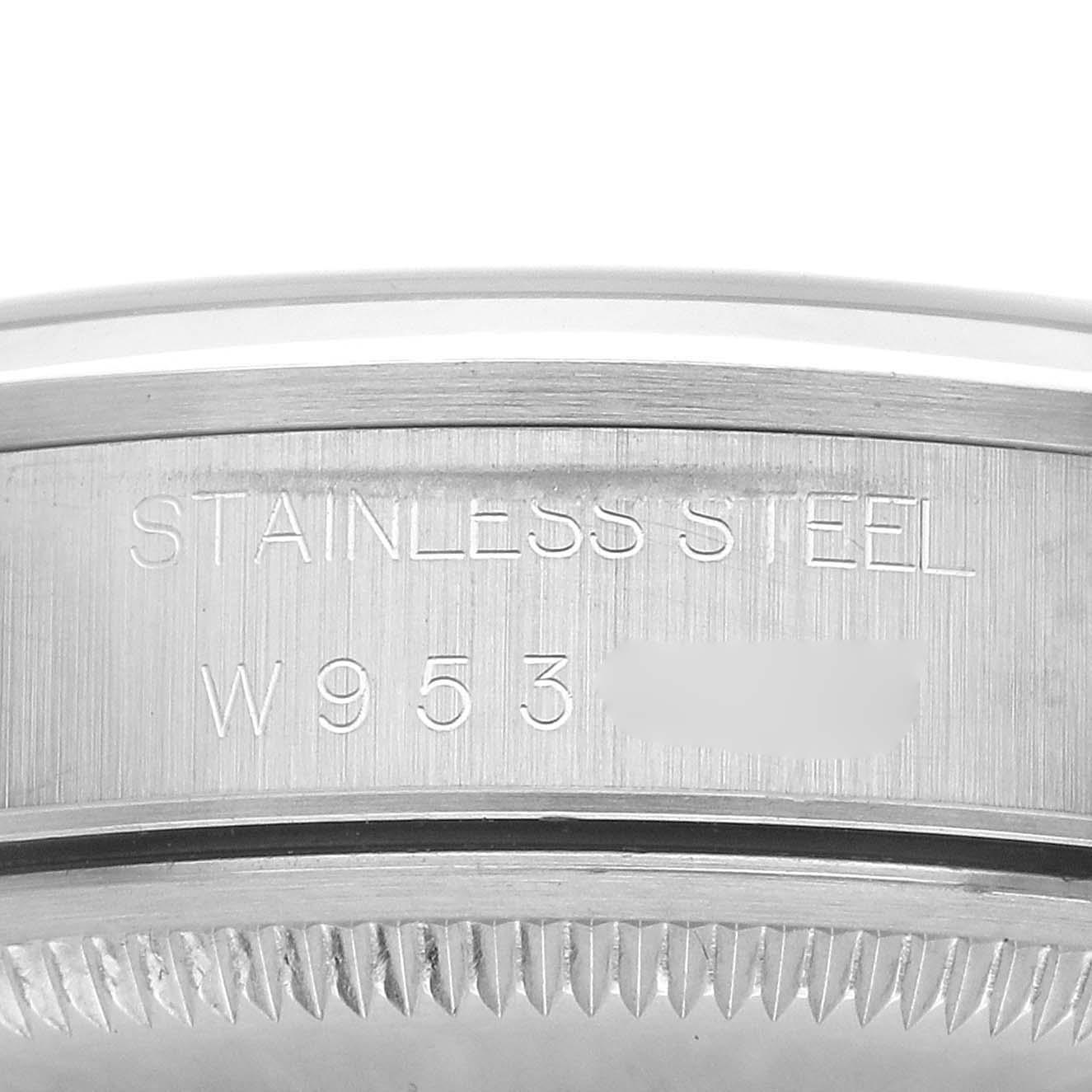 The image shows a close-up of the side of a Rolex Air-King 14000 Men's Stainless Steel Black Dial watch with "STAINLESS STEEL" engraved.
