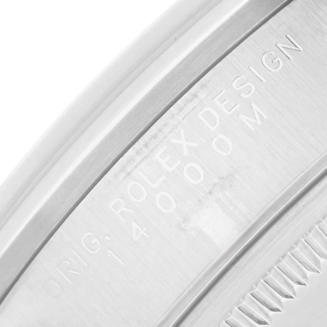 The image shows a close-up of the case back of the Rolex Air-King 14000 Men's Stainless Steel Silver Dial, highlighting the engraved text.