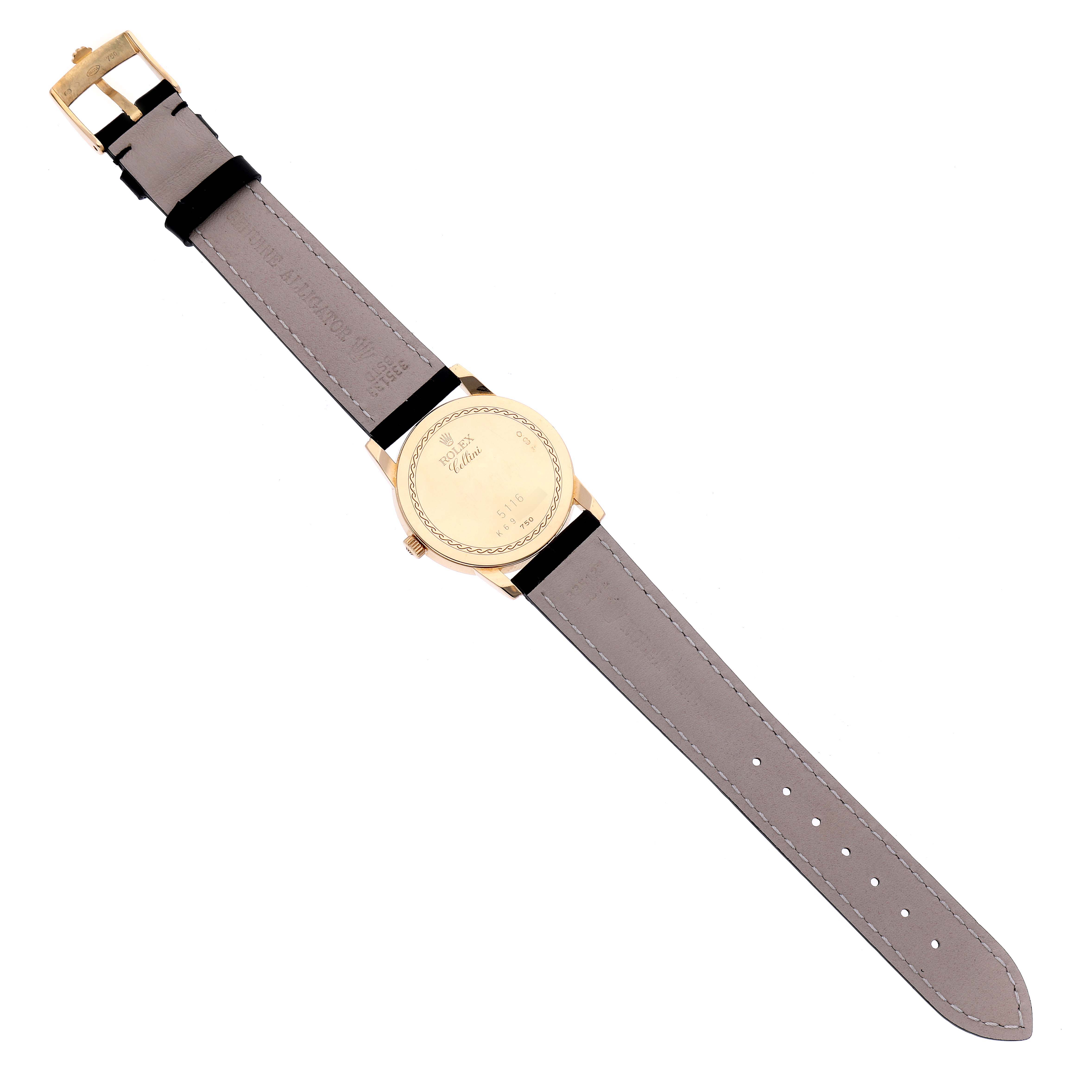 This image shows the back view of a Rolex Cellini 5116 Men's Yellow Gold Beige Dial 5116 Men's Yellow Gold Beige Dial watch, displaying the case back and leather strap.