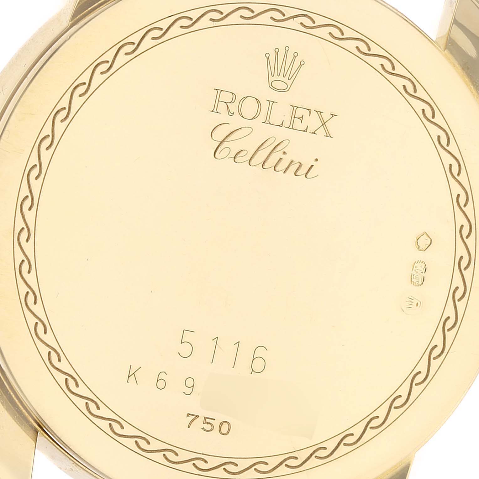 This image shows the back case of a Rolex Cellini 5116 Men's Yellow Gold Beige Dial 5116 Men's Yellow Gold Beige Dial watch, featuring model number 5116 engraved on it.