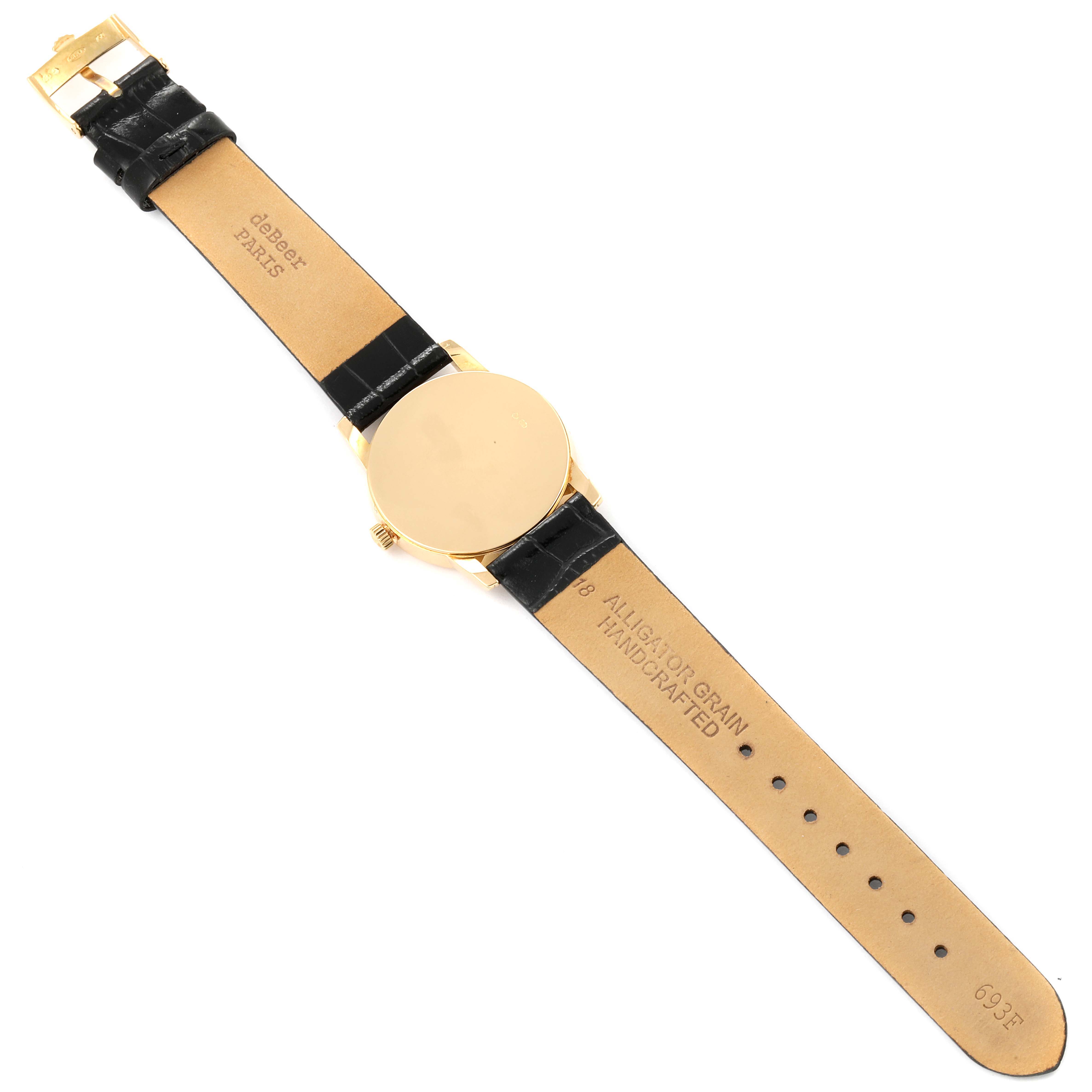 The image shows the back view of a Rolex Cellini 5116/8 Men's Yellow Gold Beige Dial 5116/8 Men's Yellow Gold Beige Dial watch, including its black leather strap and gold case.