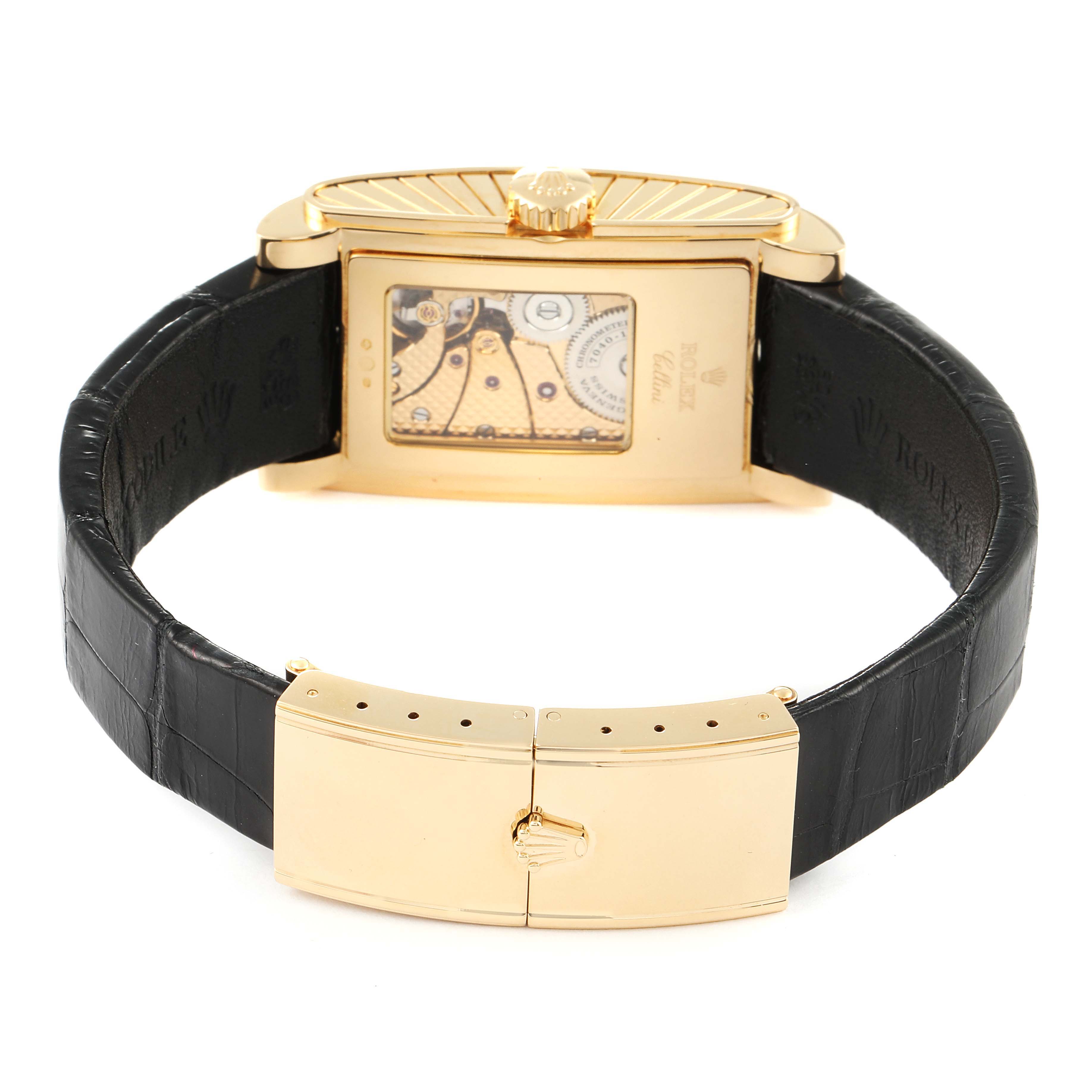 The image shows the back view of a Rolex Cellini 5440/8 Men's Yellow Gold Champagne Dial 5440/8 Men's Yellow Gold Champagne Dial watch, highlighting its gold case, visible movement, and leather strap with a clasp.