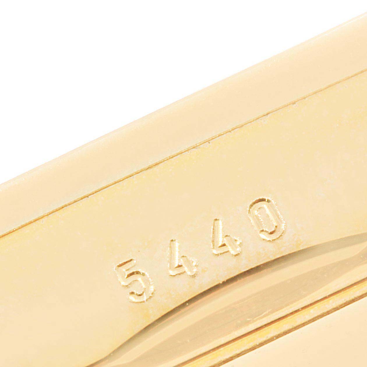 This image shows a close-up of the case back of a Rolex Cellini 5440/8 Men's Yellow Gold Champagne Dial 5440/8 Men's Yellow Gold Champagne Dial watch, focusing on the engraved serial number "5440."