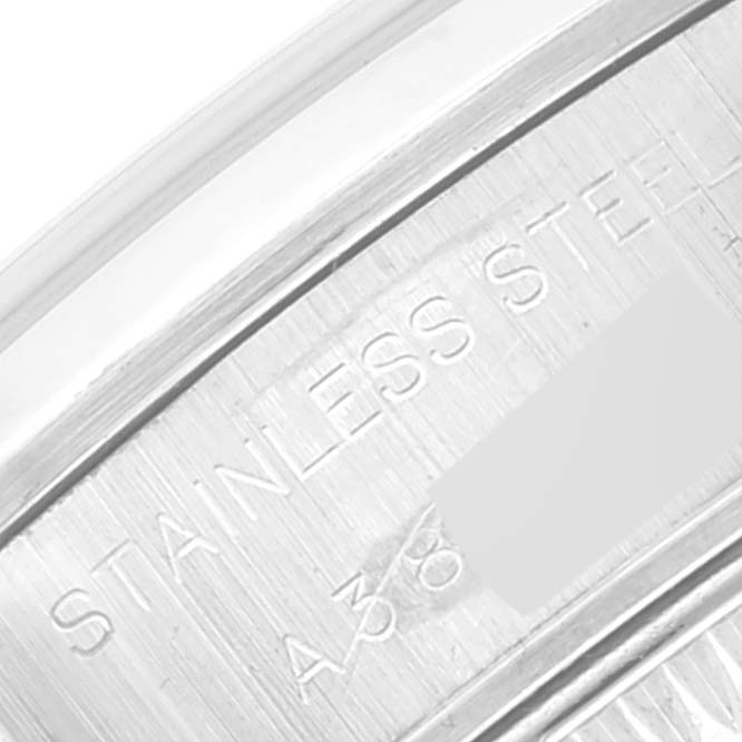 This close-up image shows the stainless steel engraving on the case back of a Rolex Date 69160 Women's Stainless Steel Blue Dial 69160 Women's Stainless Steel Blue Dial model watch.