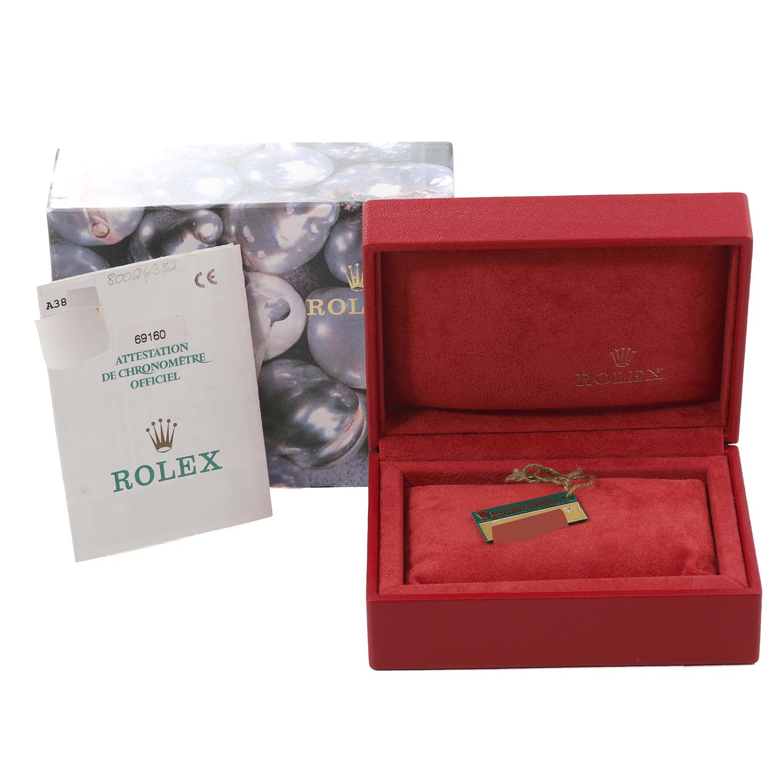 The image shows a Rolex Date 69160 Women's Stainless Steel Blue Dial 69160 Women's Stainless Steel Blue Dial model's red watch box, warranty papers, and tag from a top angle.