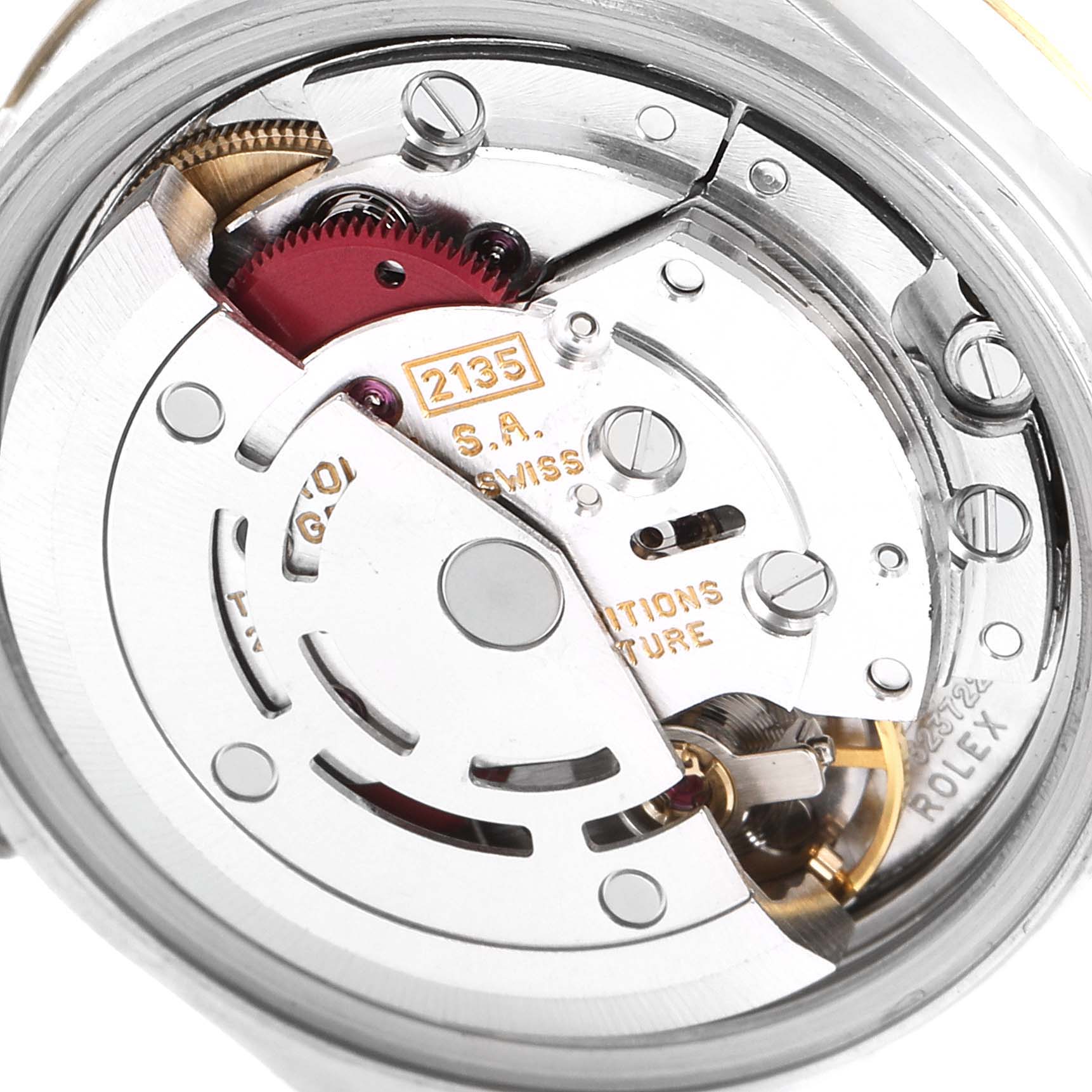 This image shows a close-up view of the movement and inner workings of a Rolex Datejust 69173 Women's Steel and Gold (two tone) Blue Dial 69173 Women's Steel and Gold (two tone) Blue Dial watch, highlighting its intricate components.