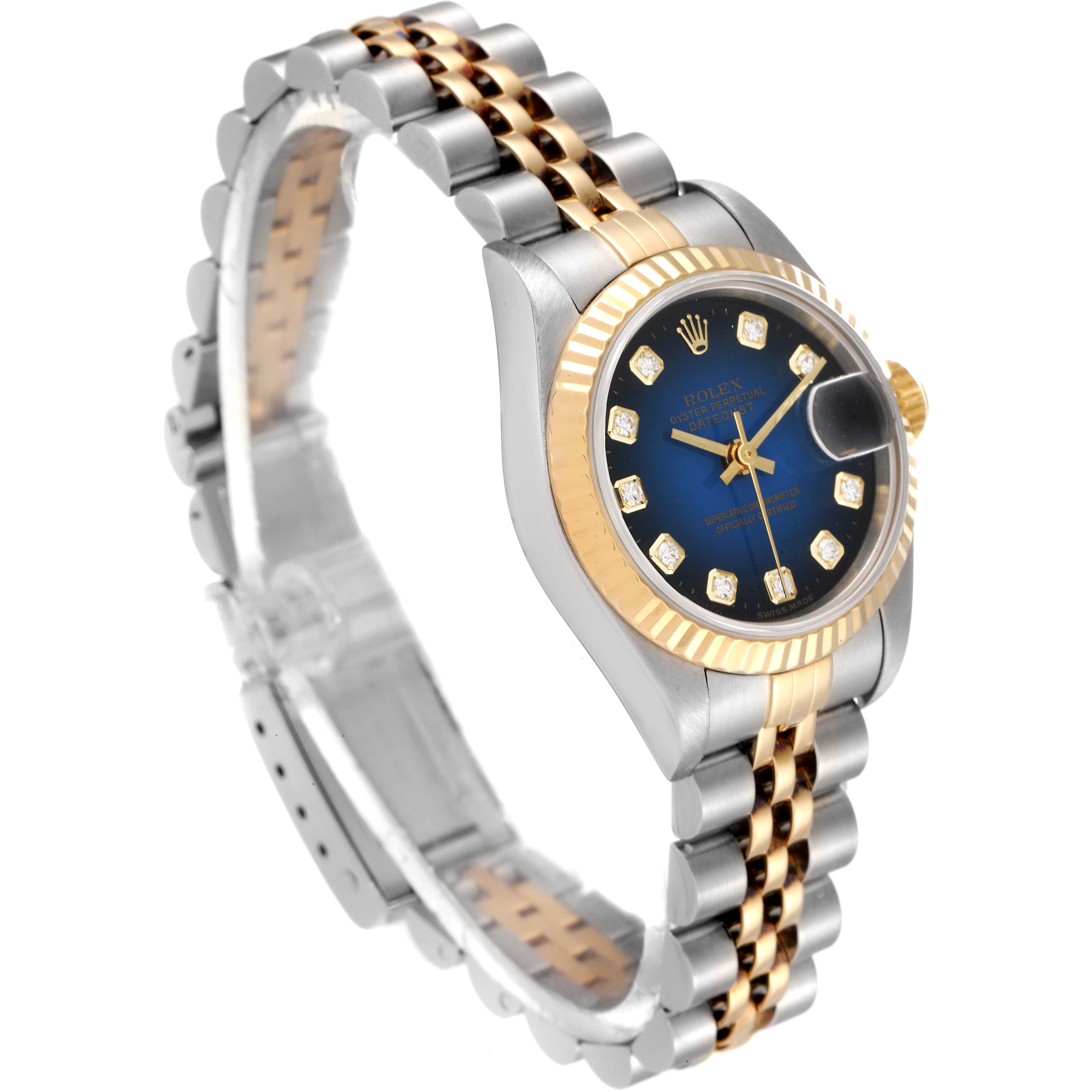 The Rolex Datejust 69173 Women's Steel and Gold (two tone) Blue Dial 69173 Women's Steel and Gold (two tone) Blue Dial watch is shown at an oblique angle, displaying the bracelet, case, dial, and bezel.