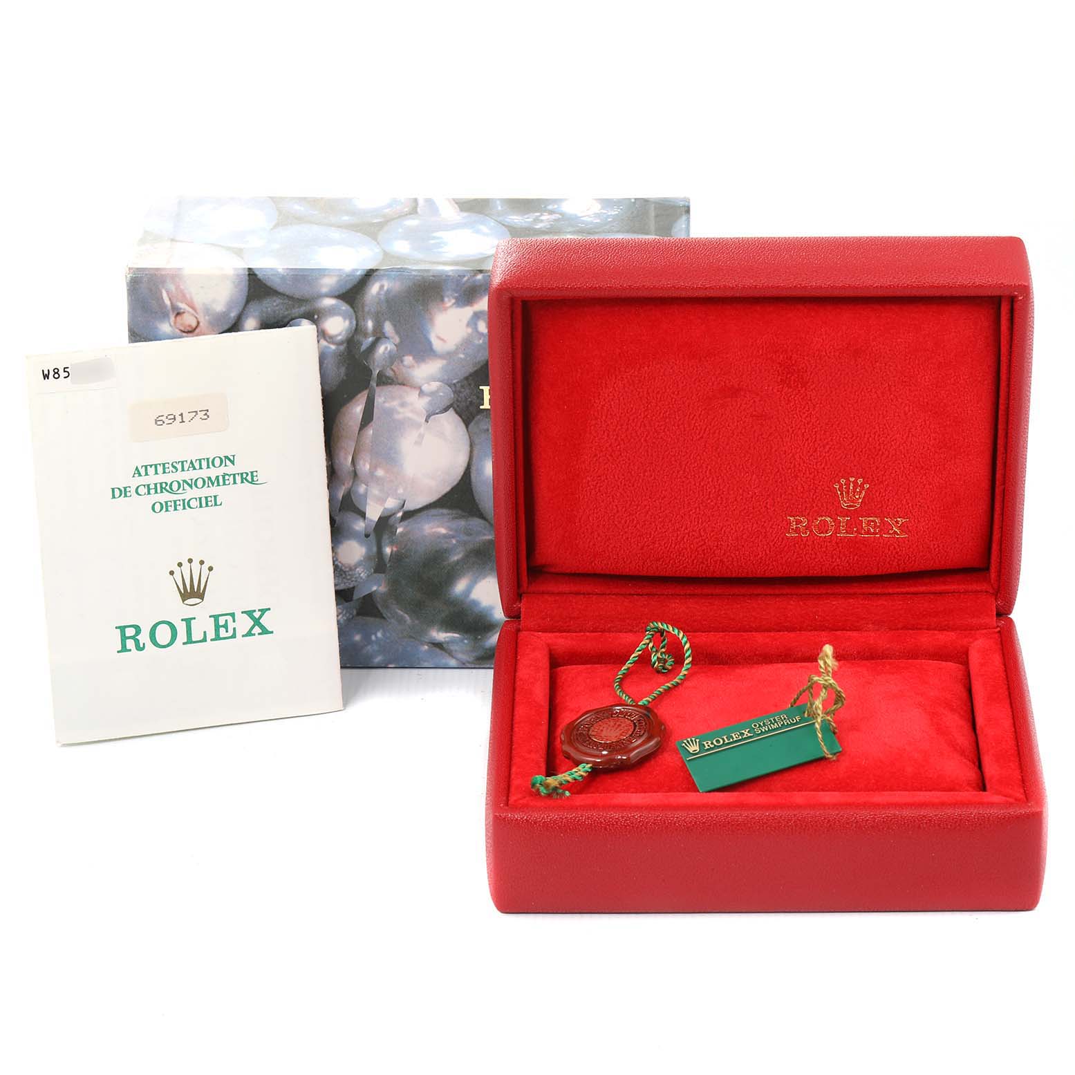 The image shows a Rolex Datejust 69173 Women's Steel and Gold (two tone) Champagne Dial 69173 Women's Steel and Gold (two tone) Champagne Dial packaging box, certification booklet, and watch tags, viewed from the front.