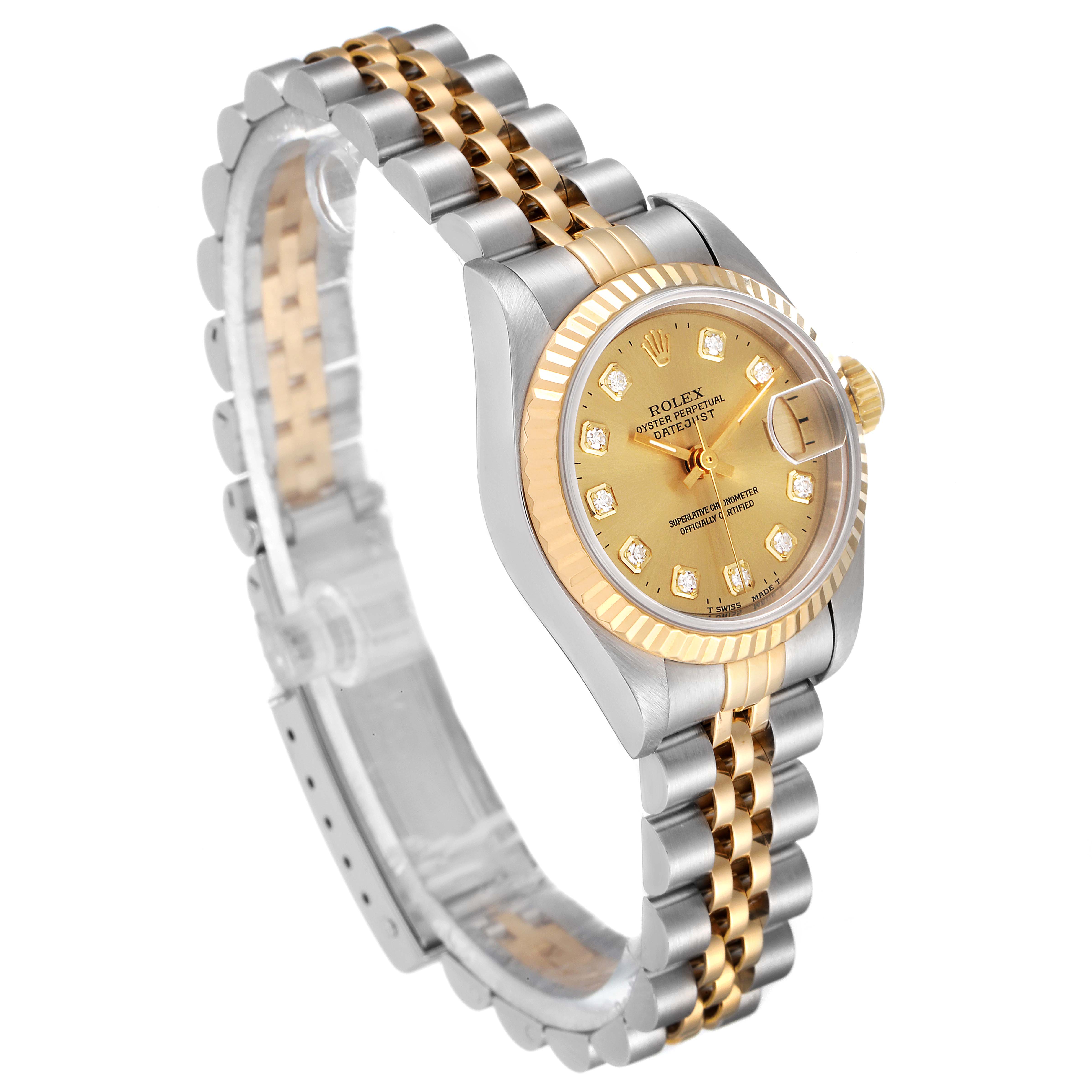 The Rolex Datejust 69173 Women's Steel and Gold (two tone) Champagne Dial 69173 Women's Steel and Gold (two tone) Champagne Dial watch is shown at a three-quarter angle, highlighting its two-tone bracelet, dial, fluted bezel, and Cyclops lens.