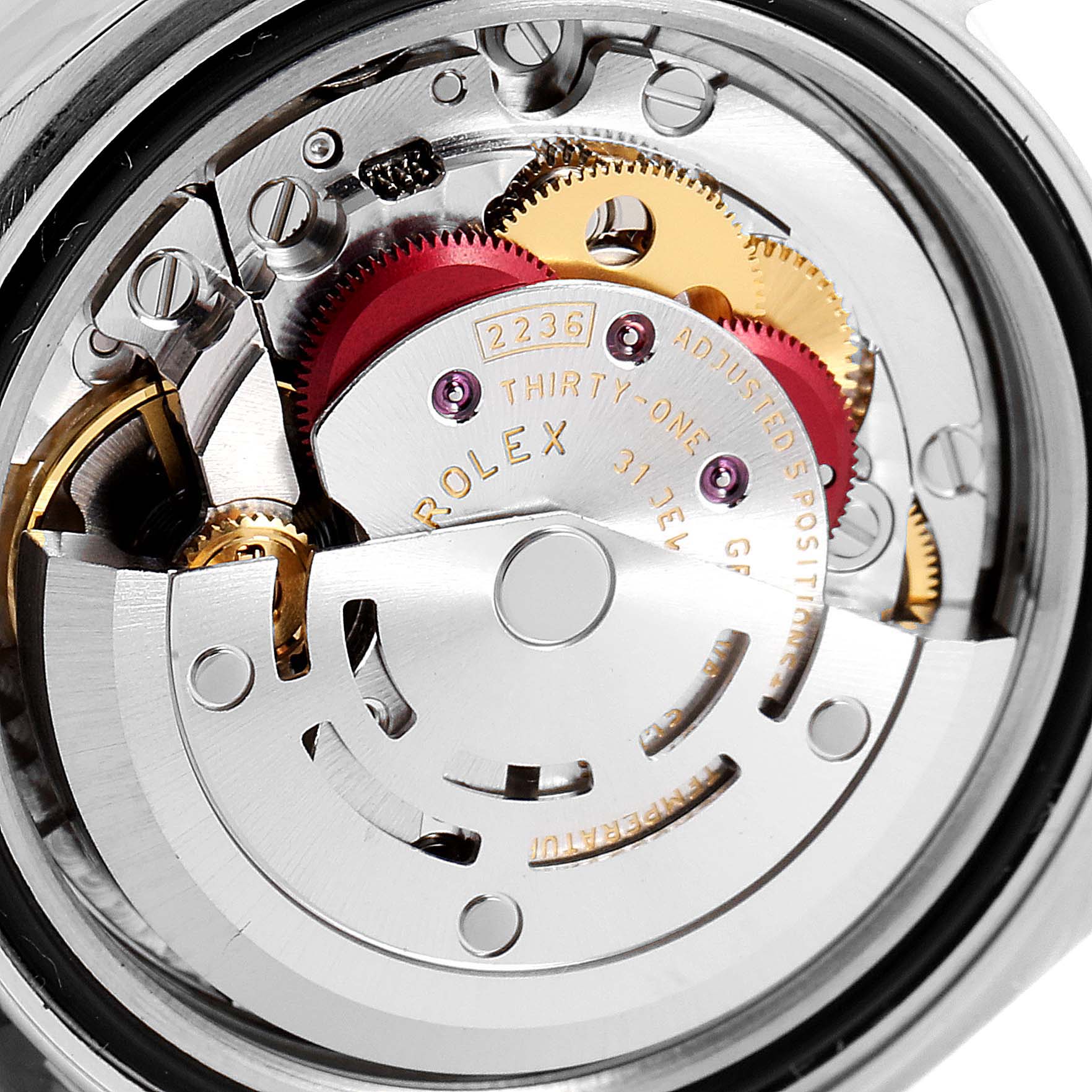 The image shows the intricate internal mechanism of a Rolex Datejust 279160 Women
s Stainless Steel White Dial 279160 Women
s Stainless Steel White Dial watch, highlighting its movement components and gear assembly.