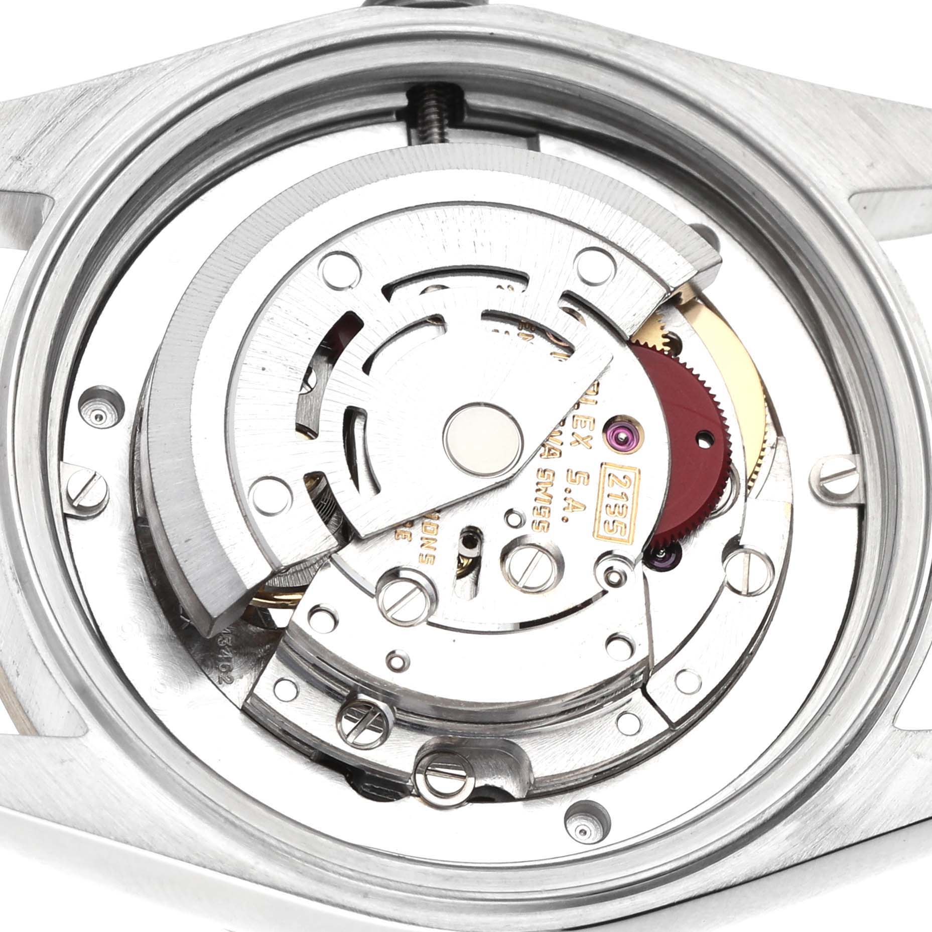 The image shows the internal mechanism of the Rolex Datejust 68273 Women's Stainless Steel Champagne Dial watch from a back angle, revealing its movement components.