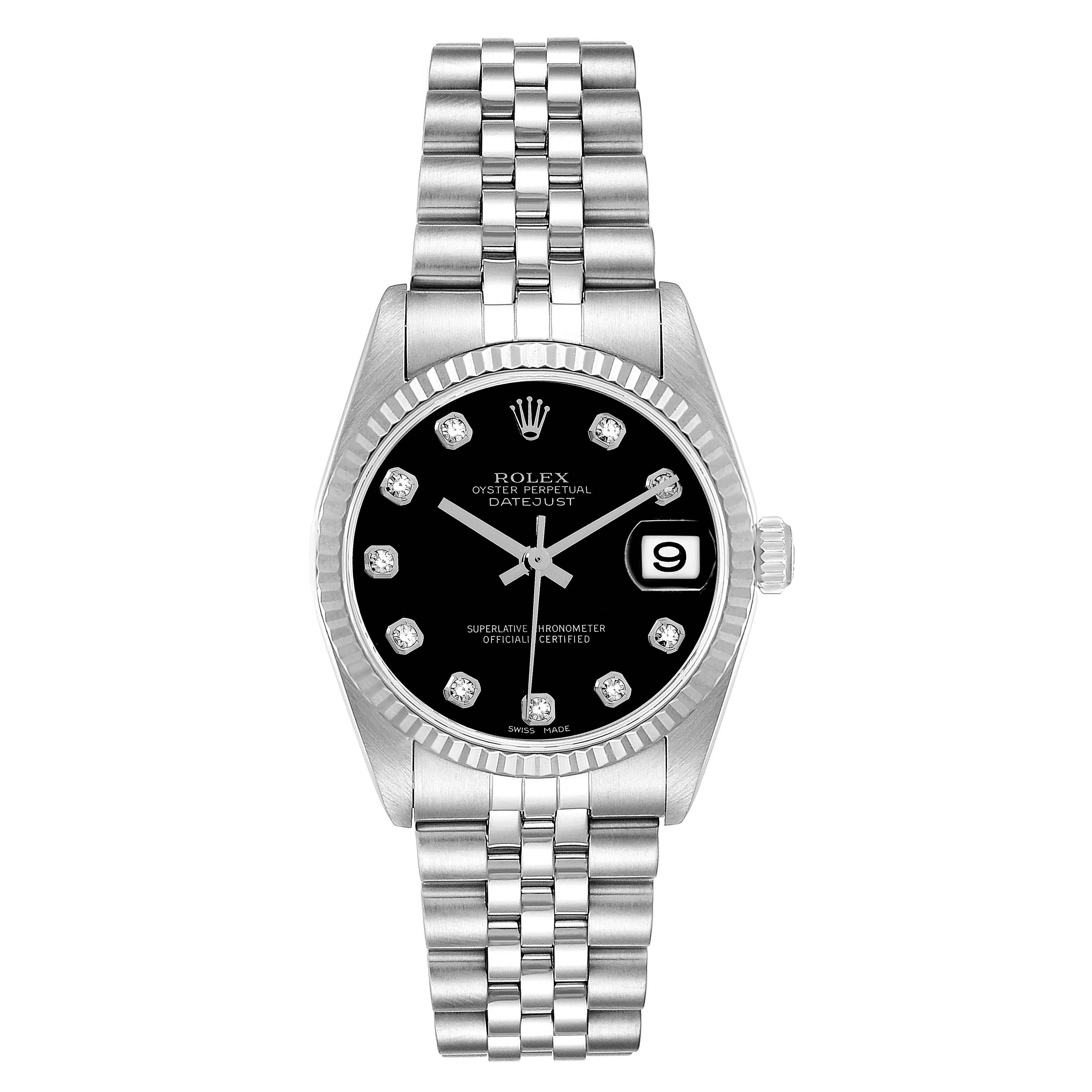 The Rolex Datejust 78274 Women's Stainless Steel Black Dial watch is shown from a top-down angle, highlighting the dial, bezel, and bracelet.