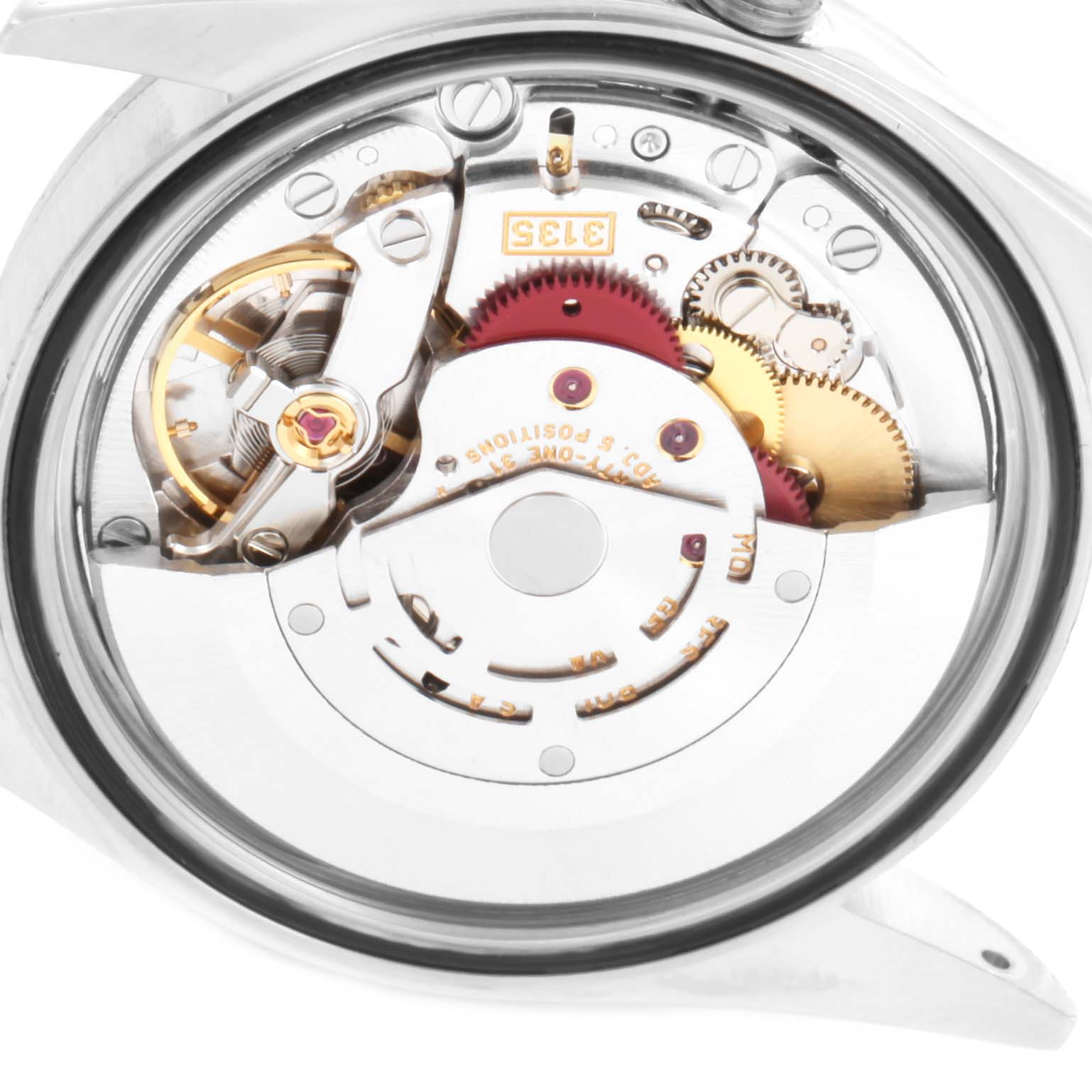 The image shows the back view of the movement and internal mechanism of a Rolex Datejust 16234 Men's Stainless Steel Pink Dial 16234 Men's Stainless Steel Pink Dial watch.