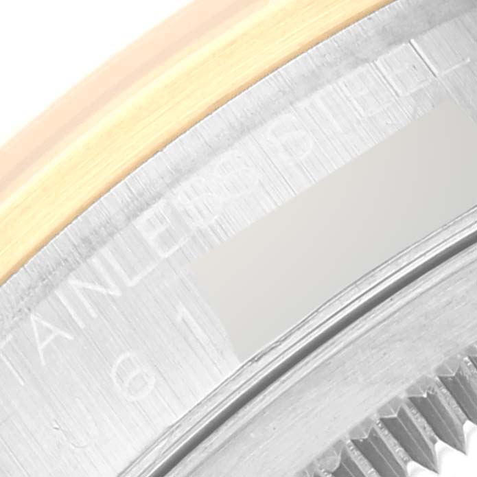 This image shows a close-up of the edge and bezel of a Rolex Datejust 16203 Men's Steel and Gold (two tone) Black Dial 16203 Men's Steel and Gold (two tone) Black Dial watch, highlighting the gold and stainless steel materials.