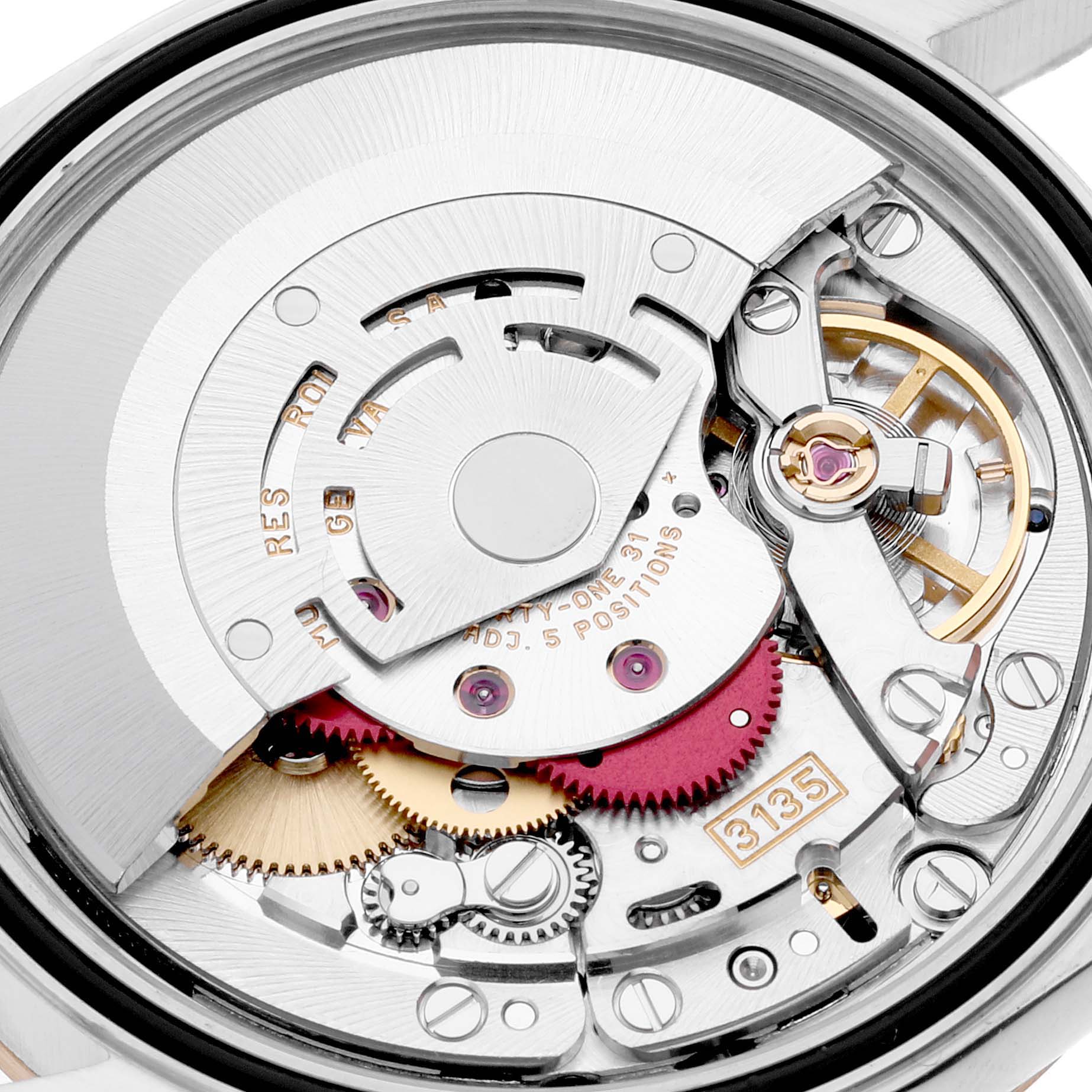 This close-up image shows the intricate internal mechanism of a Rolex Datejust 16203 Men's Steel and Gold (two tone) Black Dial 16203 Men's Steel and Gold (two tone) Black Dial, highlighting gears and the rotor.