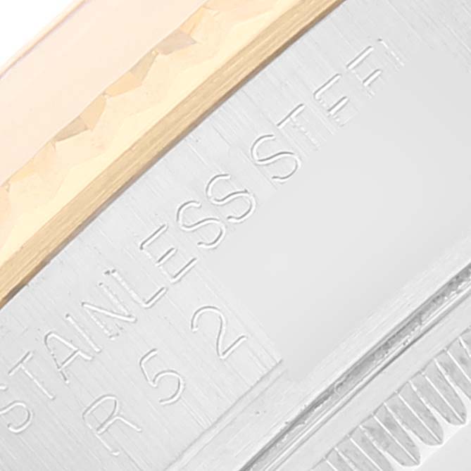 The image shows a close-up of the stainless steel case and fluted bezel of a Rolex Datejust 16013 Men's Steel and Gold (two tone) Champagne Dial 16013 Men's Steel and Gold (two tone) Champagne Dial watch.