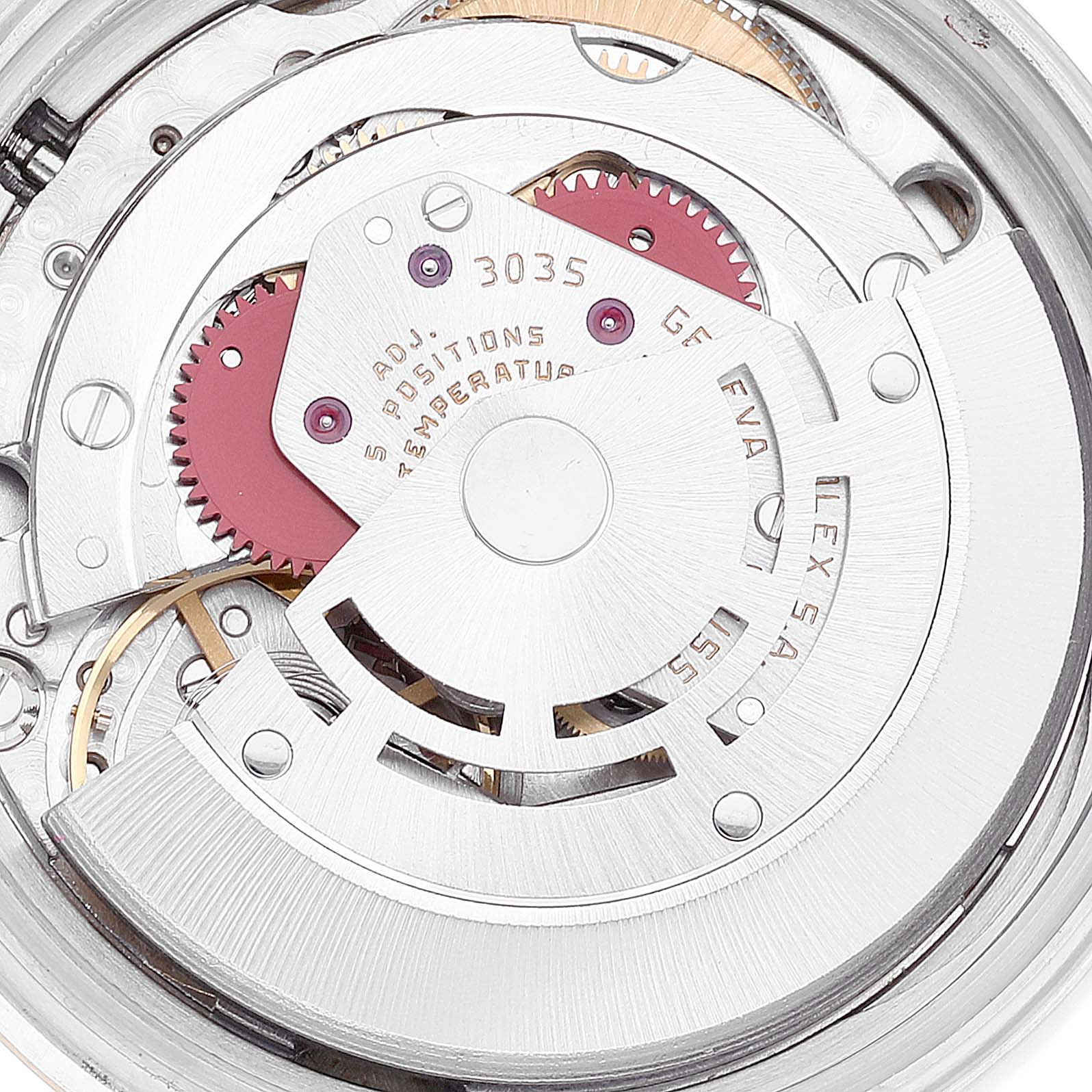 The close-up view of the Rolex Datejust 16013 Men's Steel and Gold (two tone) Champagne Dial 16013 Men's Steel and Gold (two tone) Champagne Dial watch showcases the internal movement mechanism and gears.