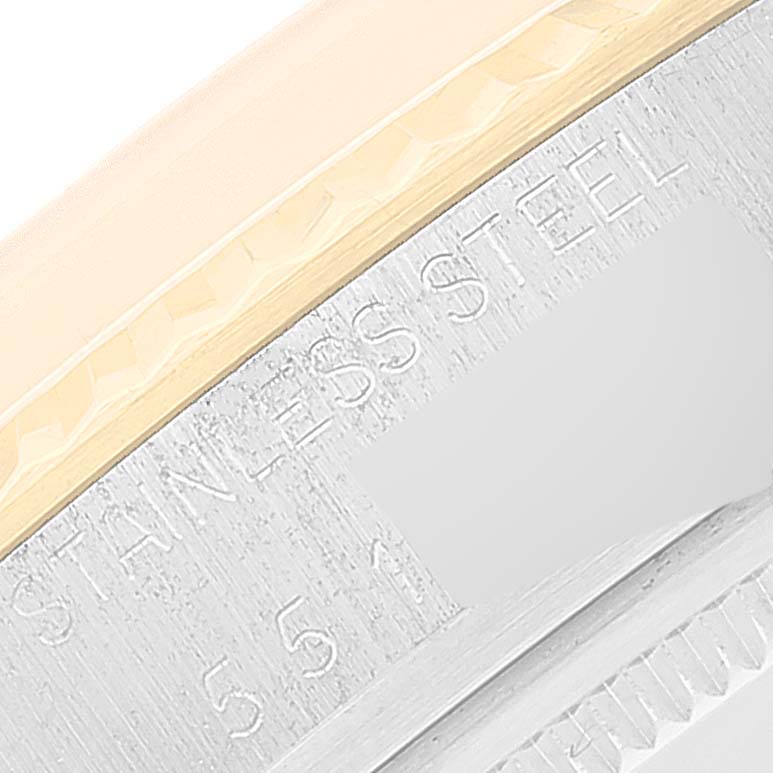 This image shows a close-up of the engraved "Stainless Steel" part of the Rolex Vintage Collection 16013 Men
s Steel and Gold (two tone) Champagne Dial 16013 Men
s Steel and Gold (two tone) Champagne Dial watch case.