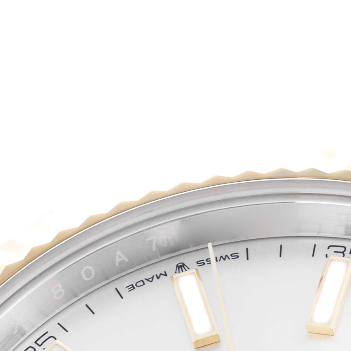 The image shows a close-up of the dial and bezel of a Rolex Datejust 41 126333 Men's Steel and Gold (two tone) Silver Dial, highlighting the watch's markers and "Swiss Made" text.