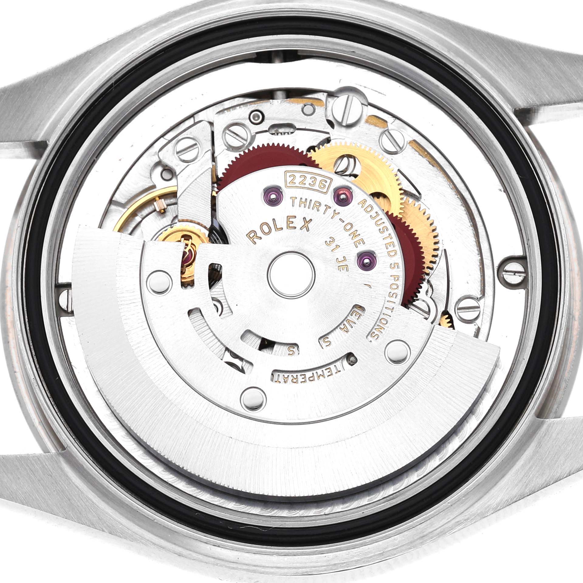 The image shows the back view of a Rolex Mid-Size 278274 Women's Stainless Steel Mother of Pearl Dial watch, highlighting its intricate movement and mechanisms.