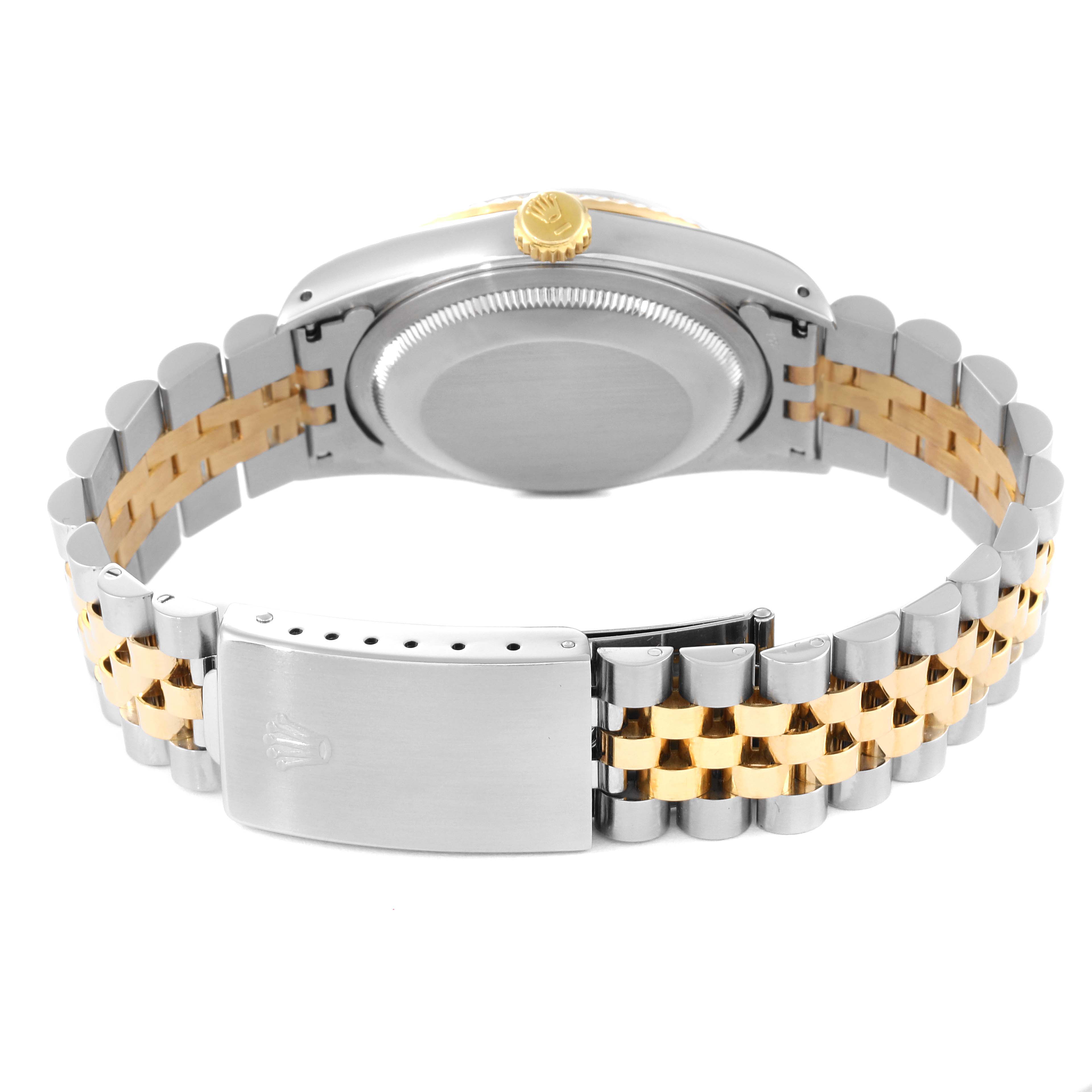 This image shows the back view of a Rolex Datejust 16233 Men's Steel and Gold (two tone) Silver Dial 16233 Men's Steel and Gold (two tone) Silver Dial watch, focusing on its two-tone bracelet and clasp.