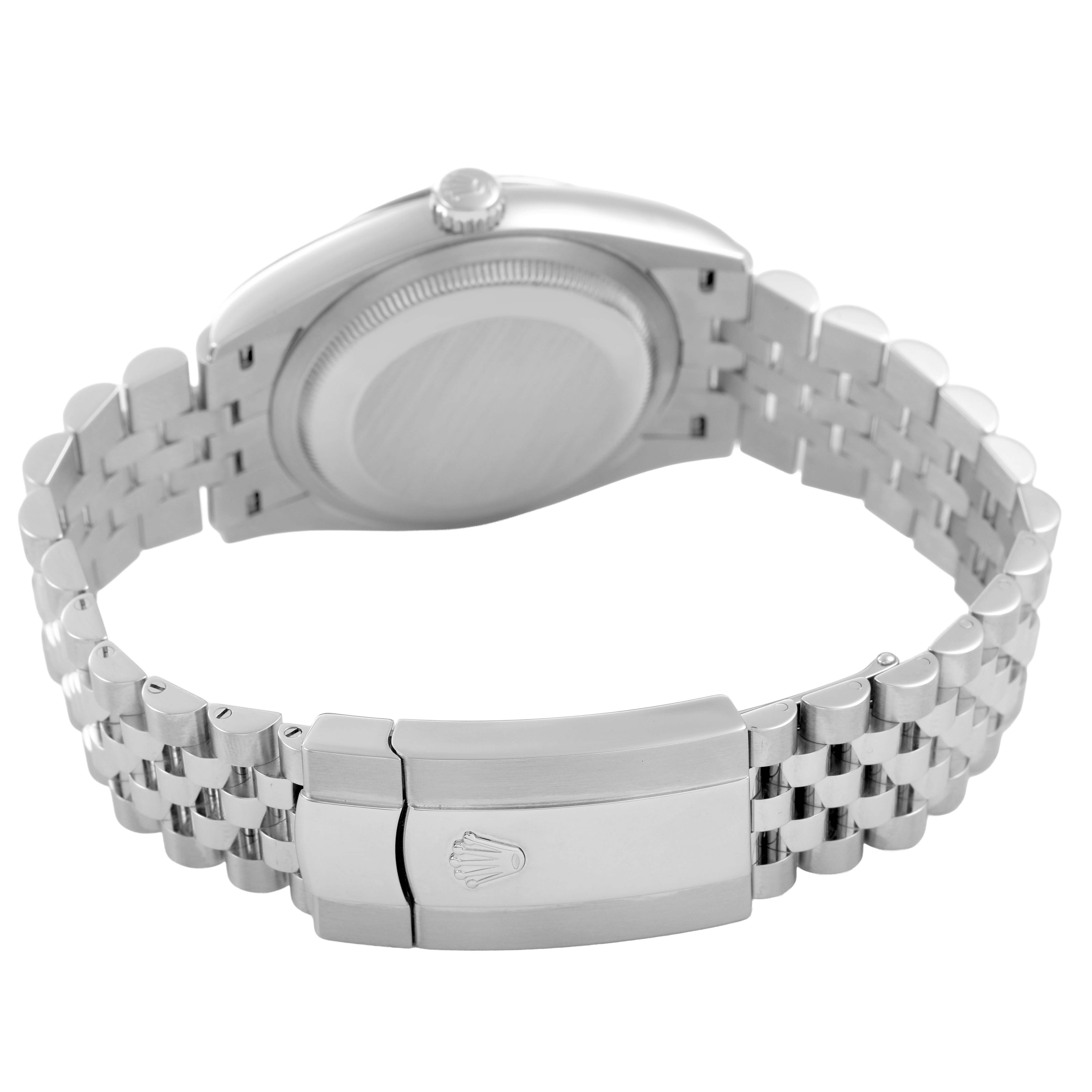 The image shows the back case, crown, and bracelet clasp of a Rolex Datejust 126234 Men's Stainless Steel Purple Dial watch, viewed from the rear angle.