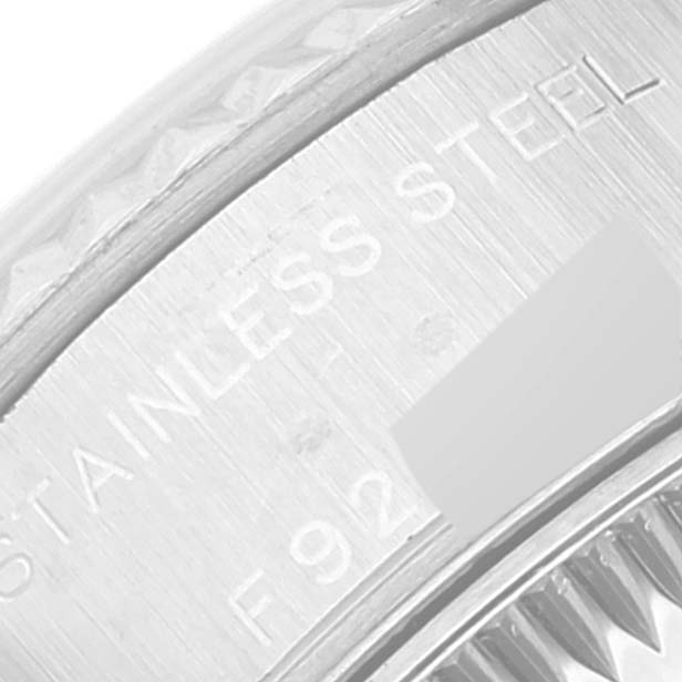 The image shows a close-up of the case side inscription of a Rolex Datejust 79174 Women's Stainless Steel White Dial 79174 Women's Stainless Steel White Dial watch, highlighting the "STAINLESS STEEL" engraving.