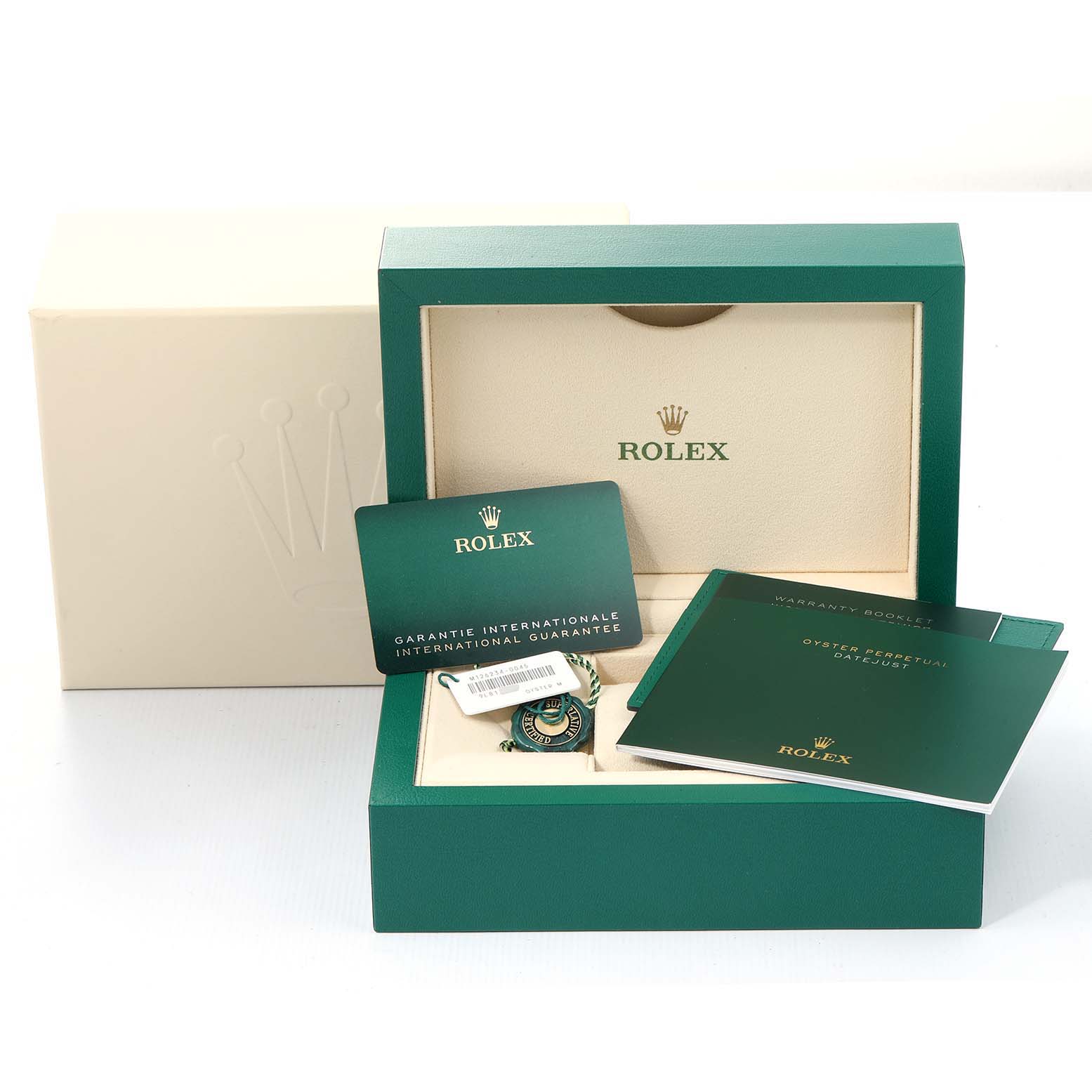 The image shows the packaging, warranty card, and manuals for a Rolex Datejust 126234 Men's Stainless Steel Grey Dial 126234 Men's Stainless Steel Grey Dial watch inside a green box.