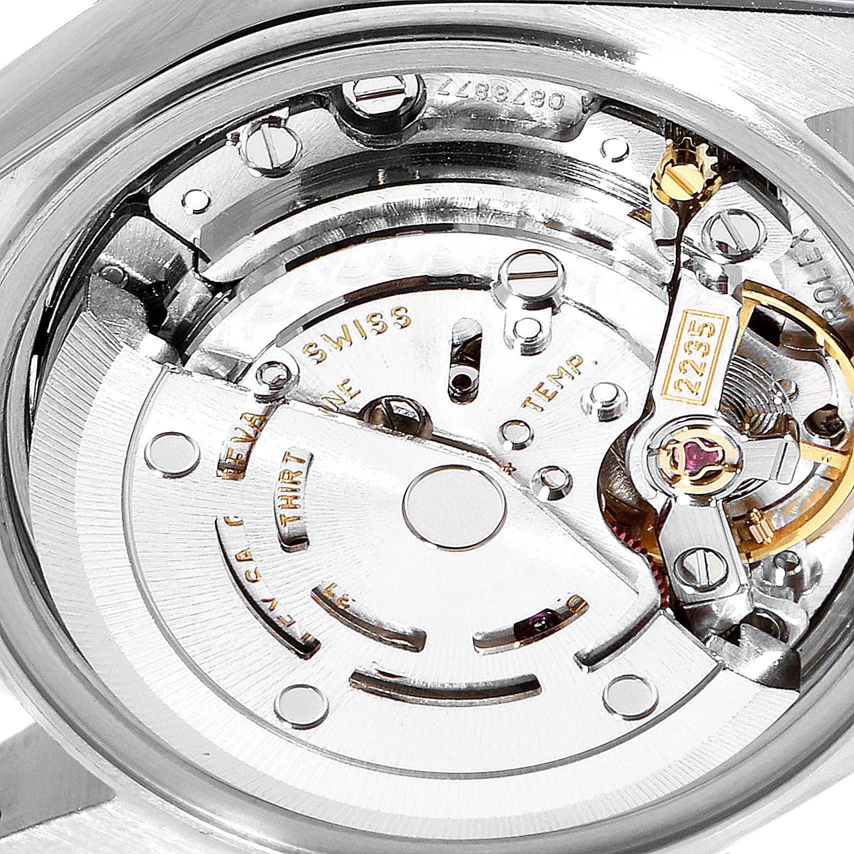 This image shows a close-up of the movement mechanism of a Rolex Datejust 79173 Women's Stainless Steel Blue Dial 79173 Women's Stainless Steel Blue Dial watch.