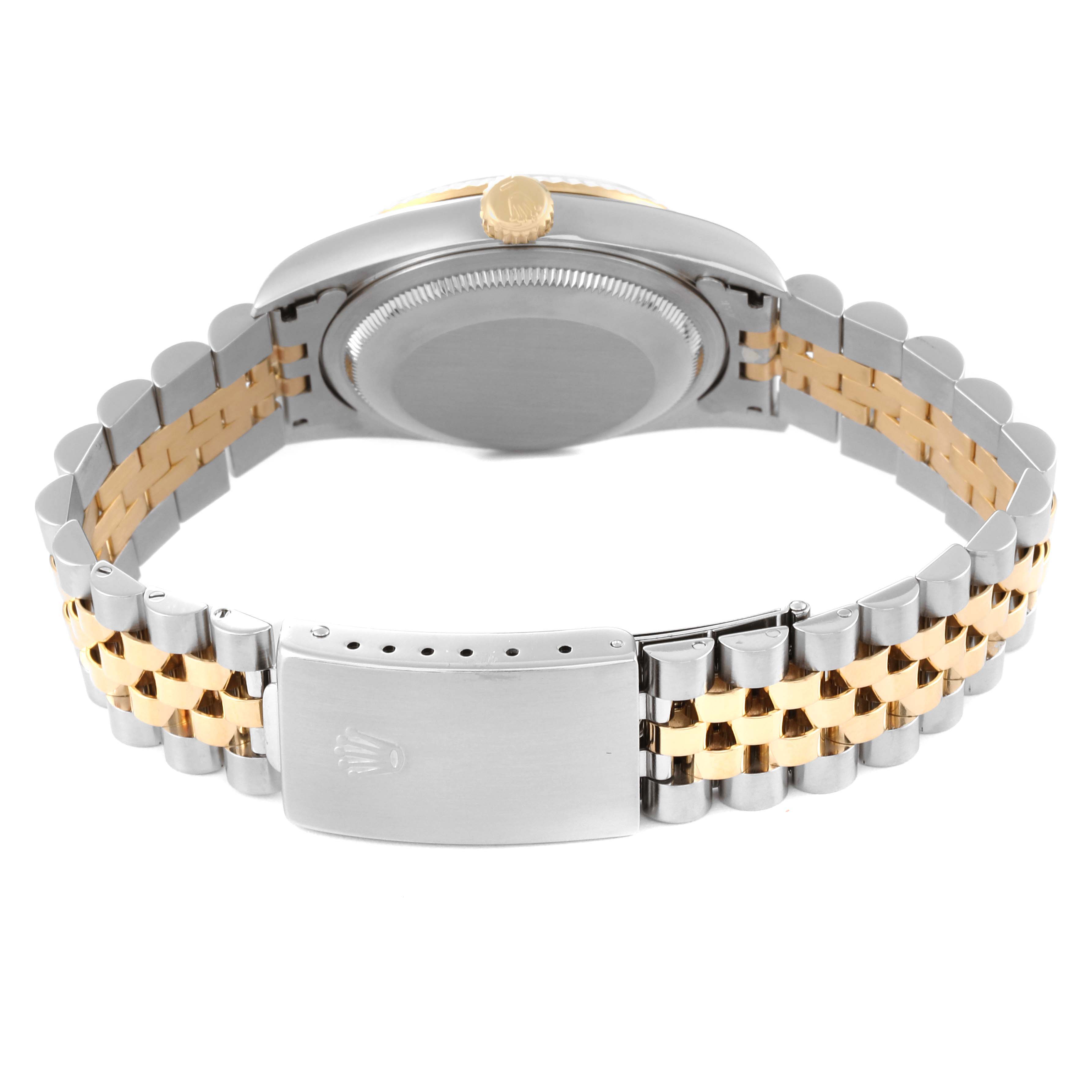 The image shows the back view of a Rolex Datejust 16233 Men's Stainless Steel Champagne Dial 16233 Men's Stainless Steel Champagne Dial watch with a two-tone bracelet and clasp.