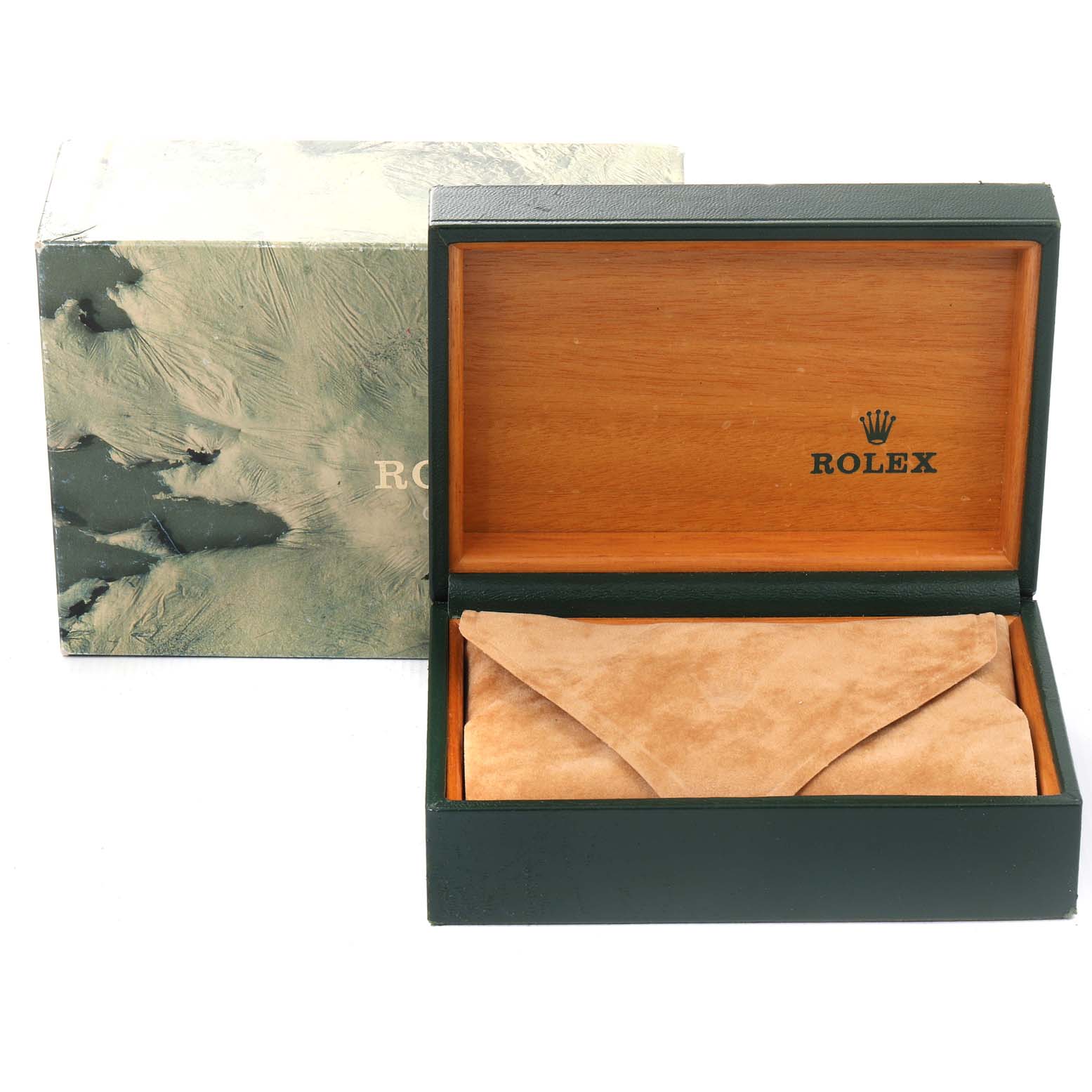 The image shows the Rolex box and packaging for the Datejust model, including a wooden box and a suede pouch.