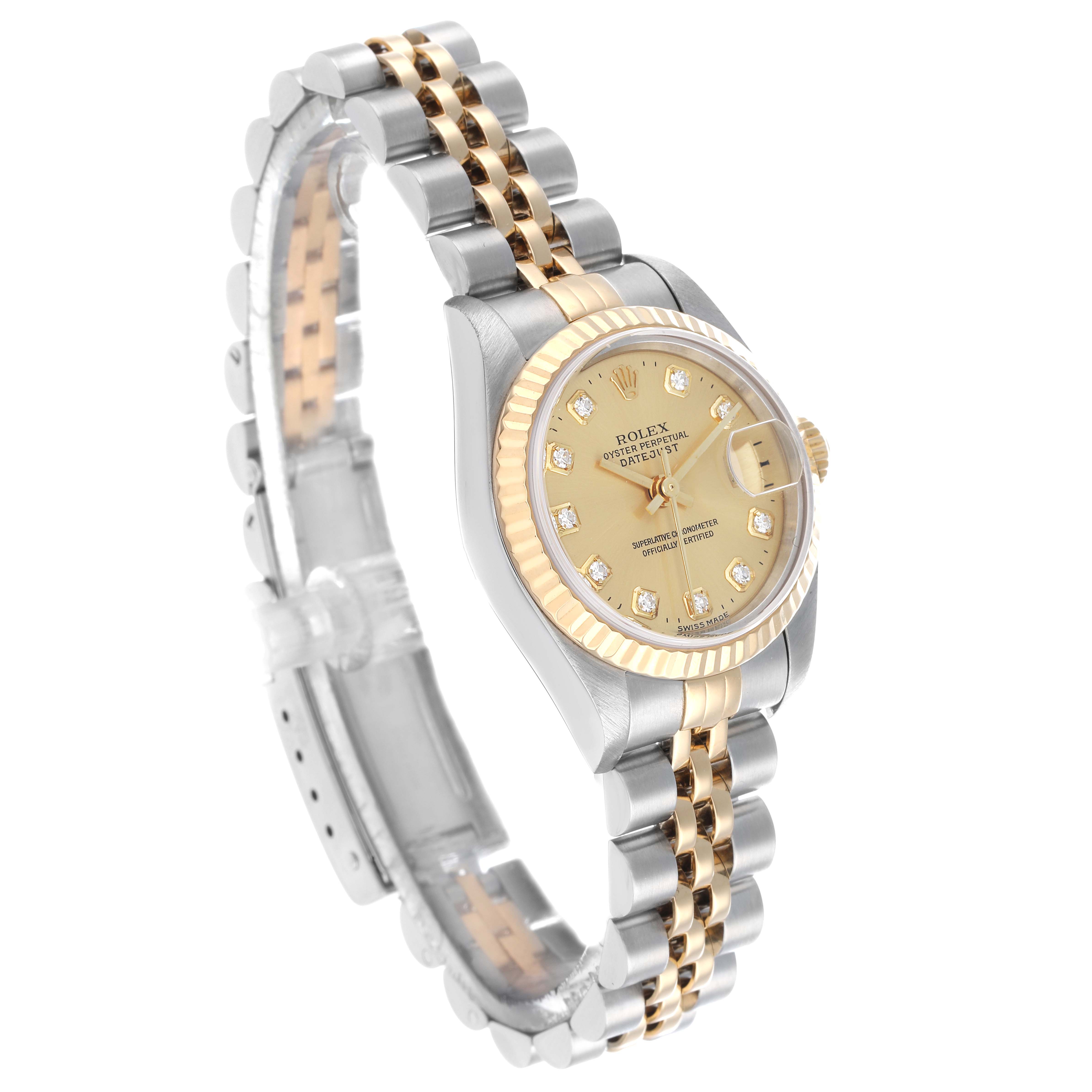 The Rolex Datejust 79173 Women's Steel and Gold (two tone) Champagne Dial is shown at a three-quarter angle, displaying its dial, bezel, and jubilee bracelet.
