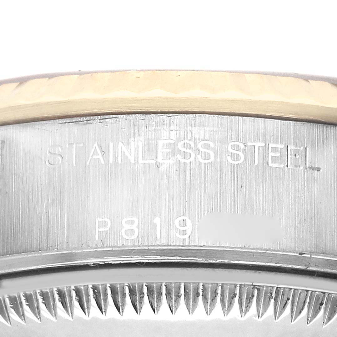 The image shows a close-up of the side of the Rolex Datejust 79173 Women's Steel and Gold (two tone) Champagne Dial watch, focusing on the stainless steel case.