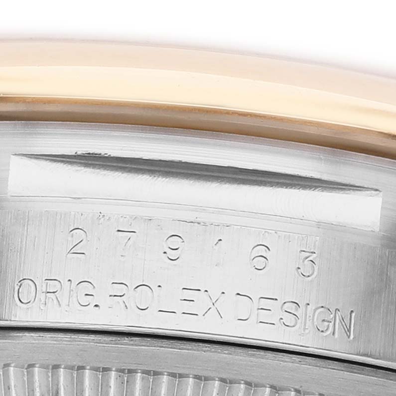 The image shows a close-up angle of the case edge and reference number on the Rolex Datejust 279163 Women's Steel and Gold (two tone) Champagne Dial watch.