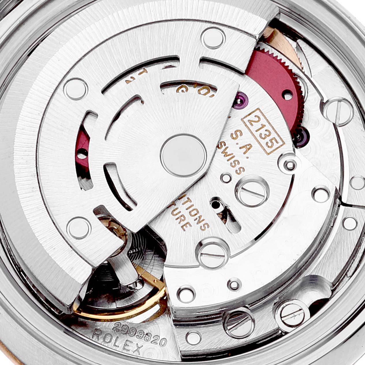 This is a close-up view of the movement inside the Rolex Datejust 69173 Women's Steel and Gold (two tone) Champagne Dial 69173 Women's Steel and Gold (two tone) Champagne Dial watch, showing intricate mechanical parts.