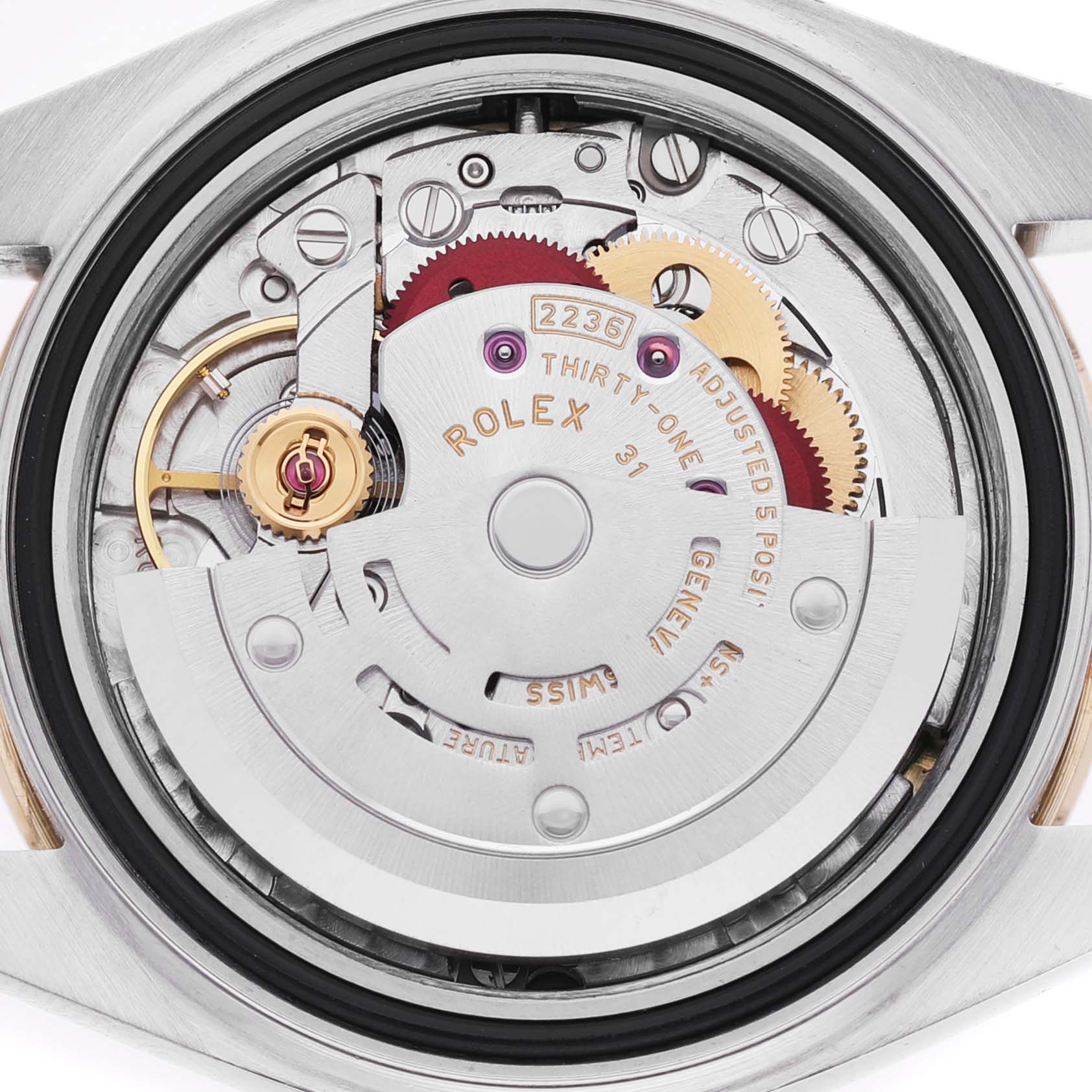 This image shows the movement of a Rolex Datejust 279163 Women's Steel and Gold (two tone) Champagne Dial watch from a top-down angle, displaying gears and the rotor.