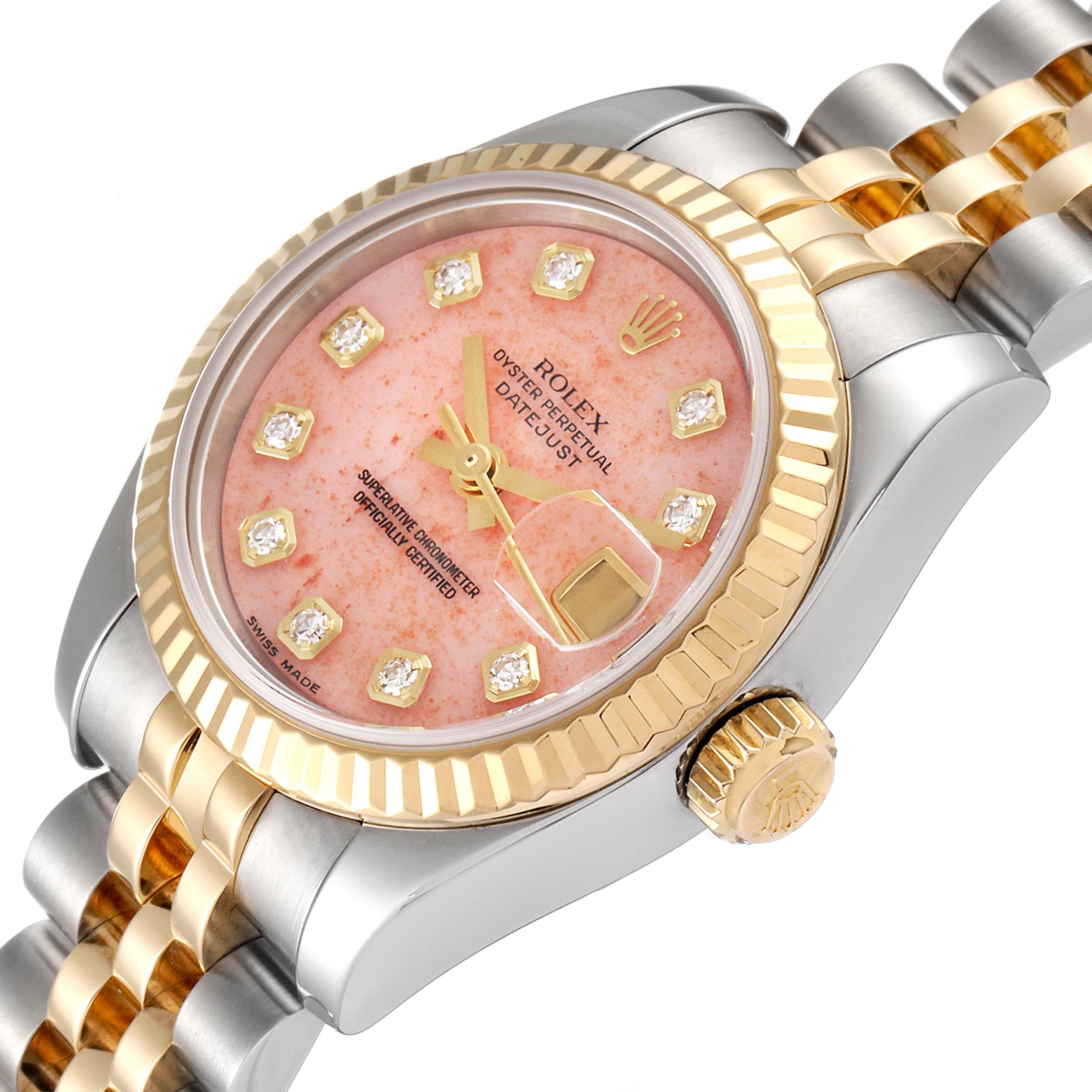 The image shows a Rolex Datejust 179173 Women's Steel and Gold (two tone) Pink Dial 179173 Women's Steel and Gold (two tone) Pink Dial watch at an angle, highlighting the face, bezel, crown, and part of the bracelet.