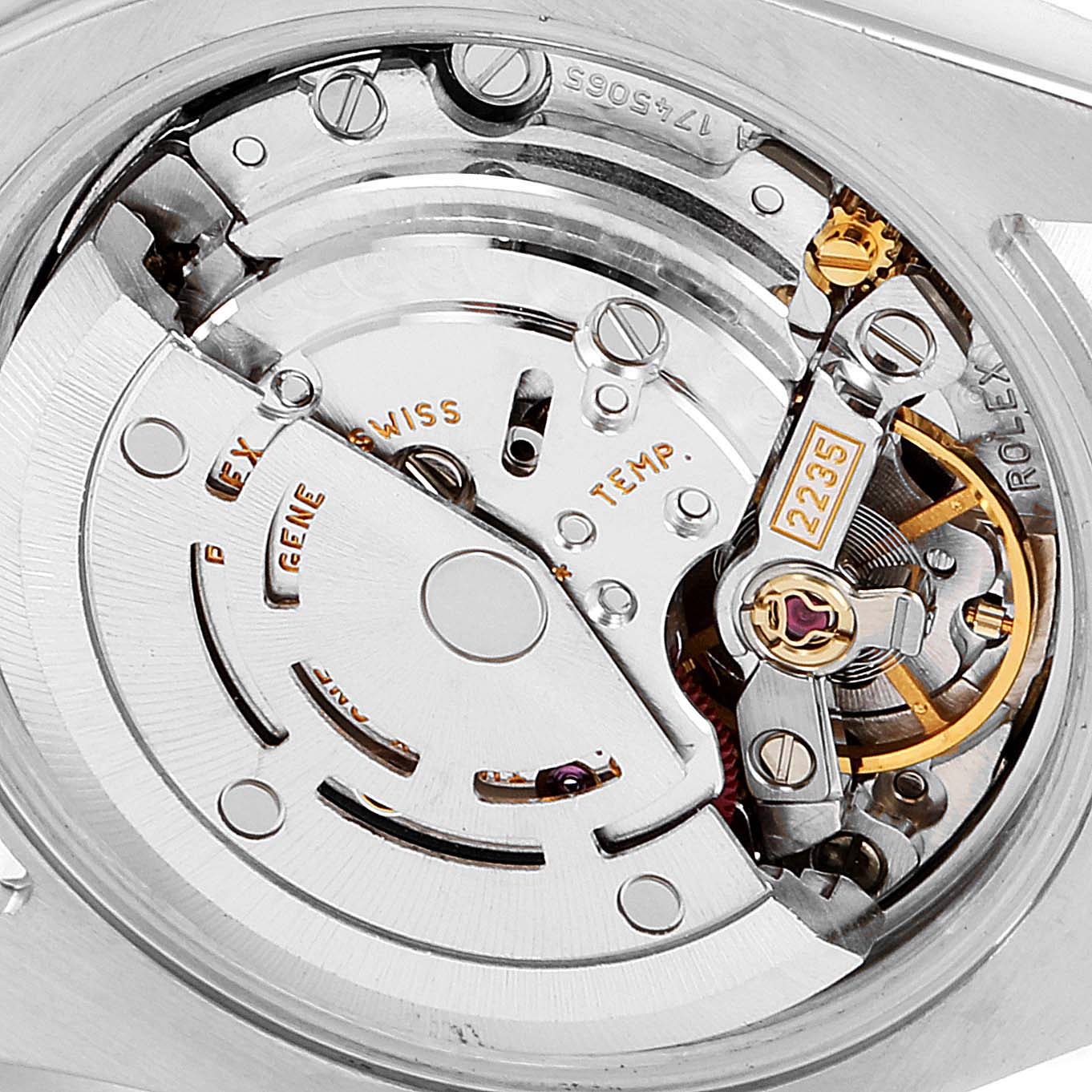 This close-up photo shows the inner mechanical movement of a Rolex Datejust 179173 Women's Steel and Gold (two tone) Pink Dial 179173 Women's Steel and Gold (two tone) Pink Dial watch.