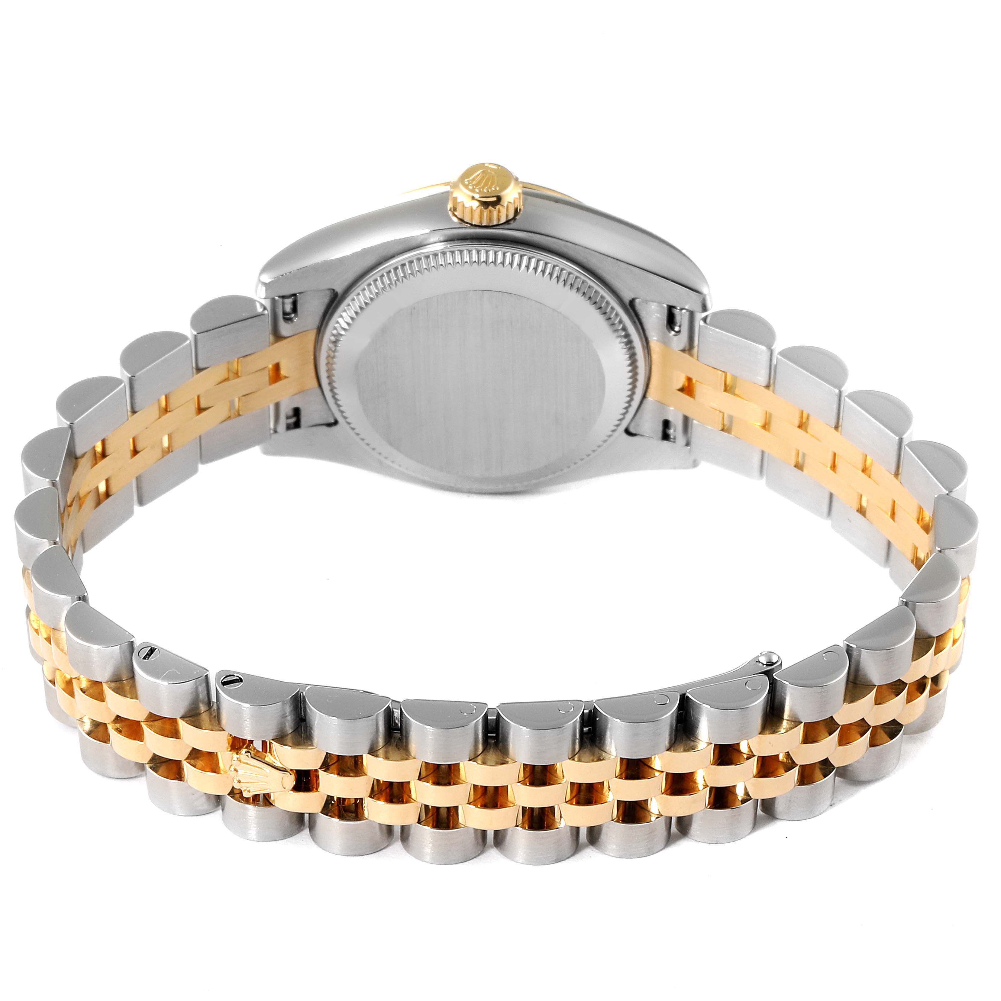 This image shows the back view of a Rolex Datejust 179173 Women's Steel and Gold (two tone) Pink Dial 179173 Women's Steel and Gold (two tone) Pink Dial model featuring the two-tone bracelet and case back.