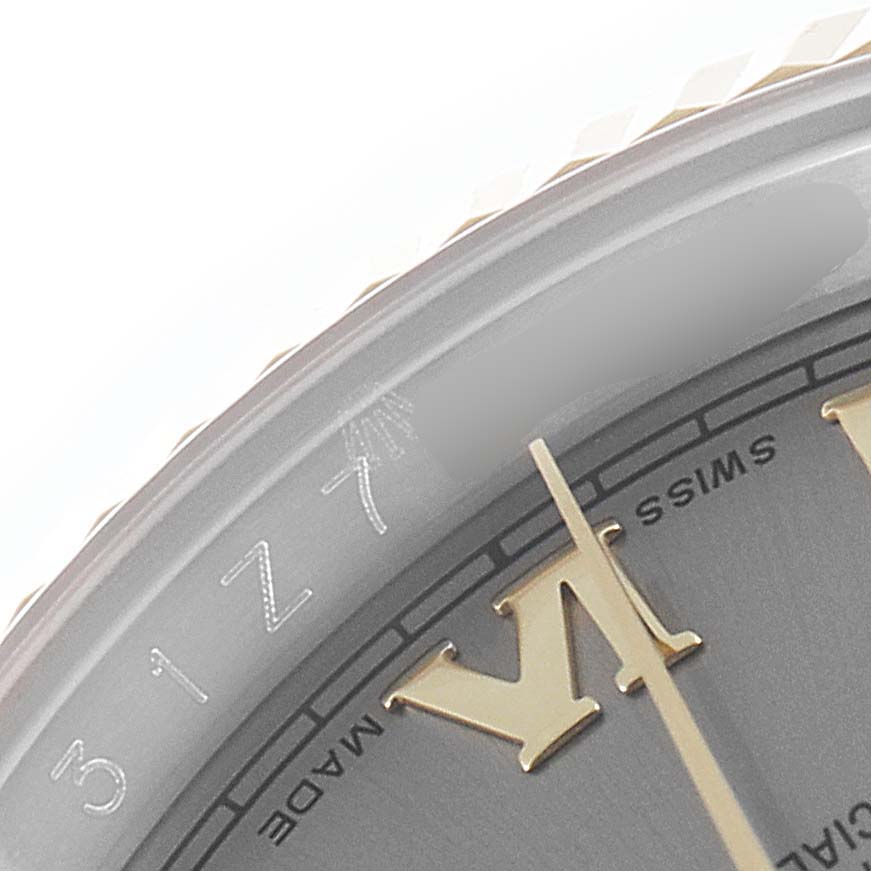 This image shows a close-up of the dial and markers near the edge of a Rolex Datejust 116233 Men's Steel and Gold (two tone) Grey Dial 116233 Men's Steel and Gold (two tone) Grey Dial watch.