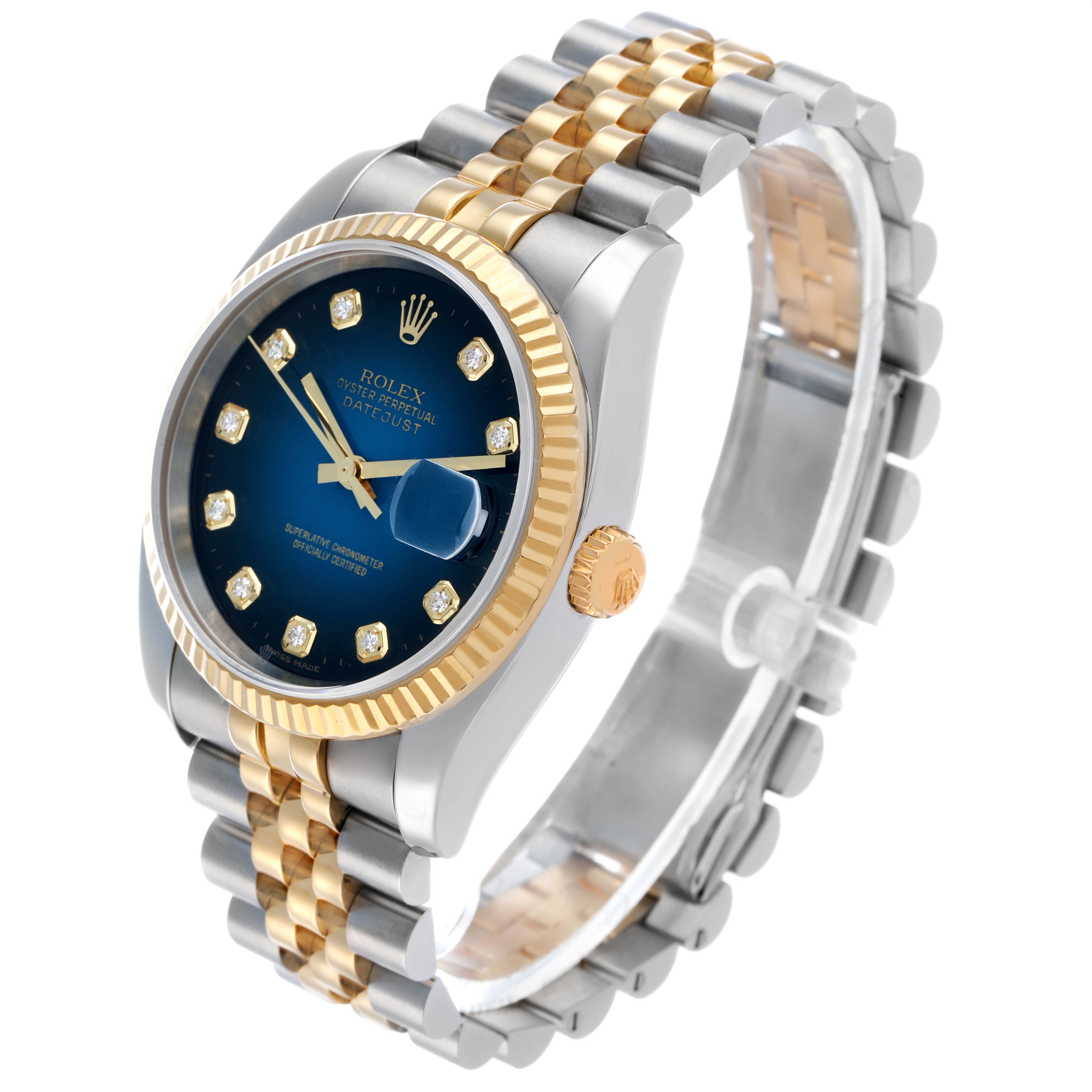 The Rolex Datejust 116233 Men's Steel and Gold (two tone) Blue Dial watch is shown at a three-quarter angle, highlighting its blue dial, diamond hour markers, two-tone bezel, and jubilee bracelet.