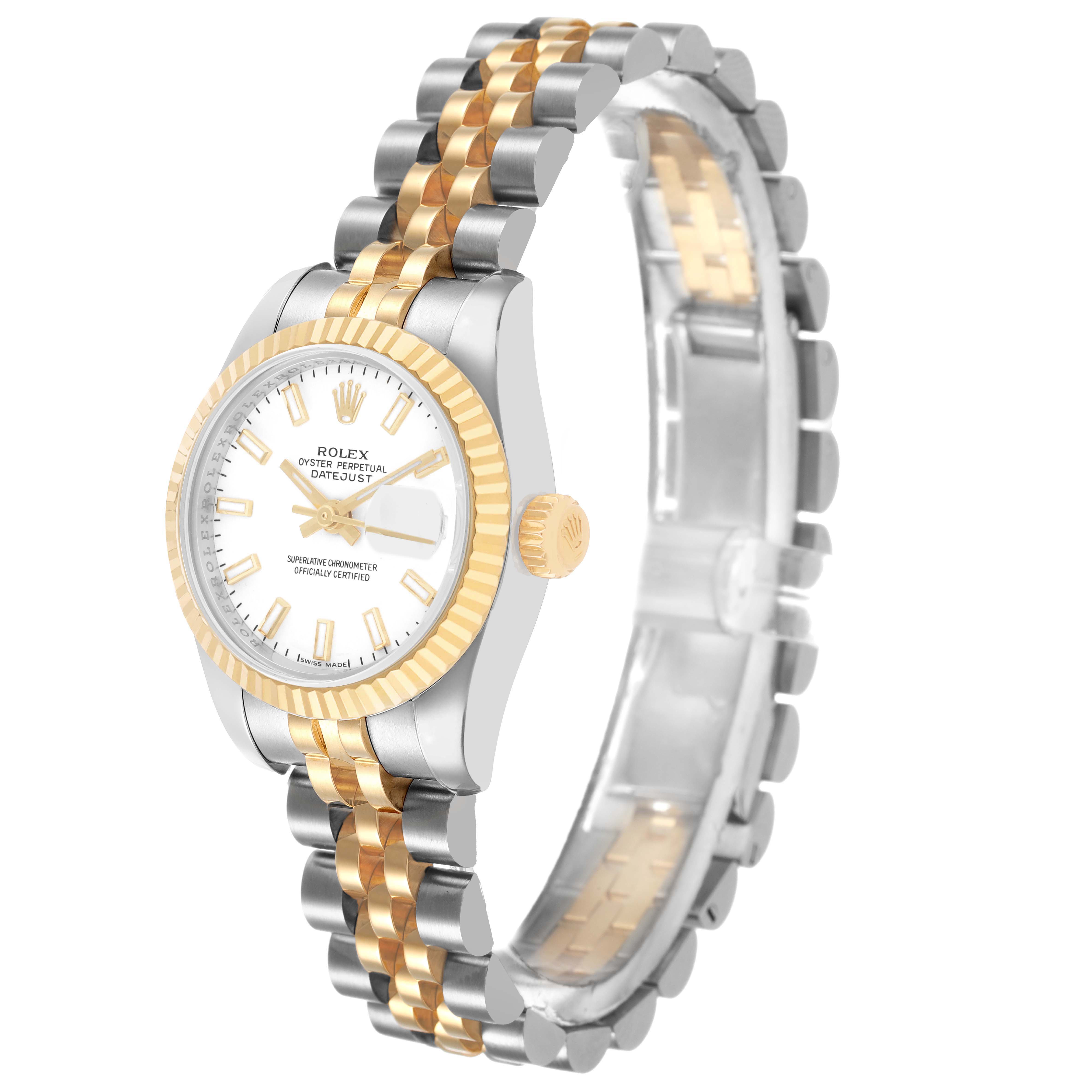 The Rolex Datejust 179173 Women's Steel and Gold (two tone) White Dial watch is shown at a three-quarter angle, highlighting the dial, crown, bezel, and two-tone bracelet.