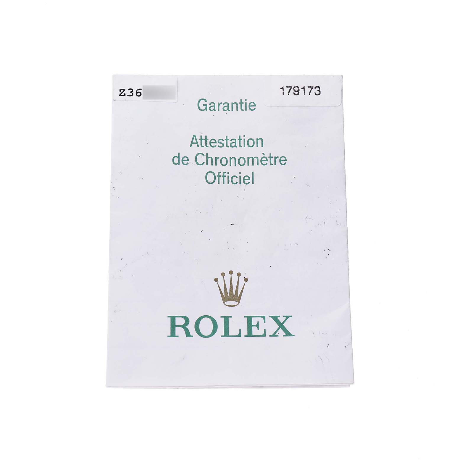 The image shows a warranty certificate for the Rolex Datejust 179173 Women's Steel and Gold (two tone) White Dial model, featuring the brand name and logo on the front.